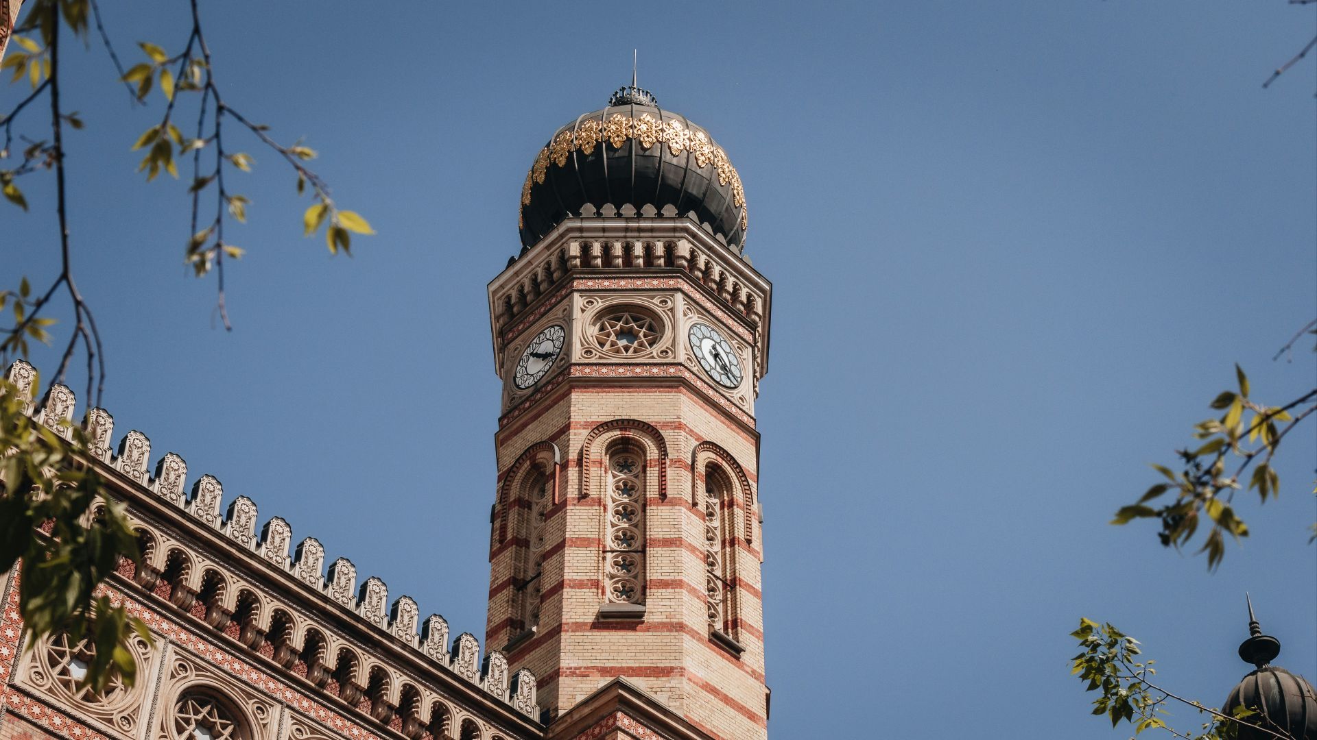 a tall tower with a clock on top of it