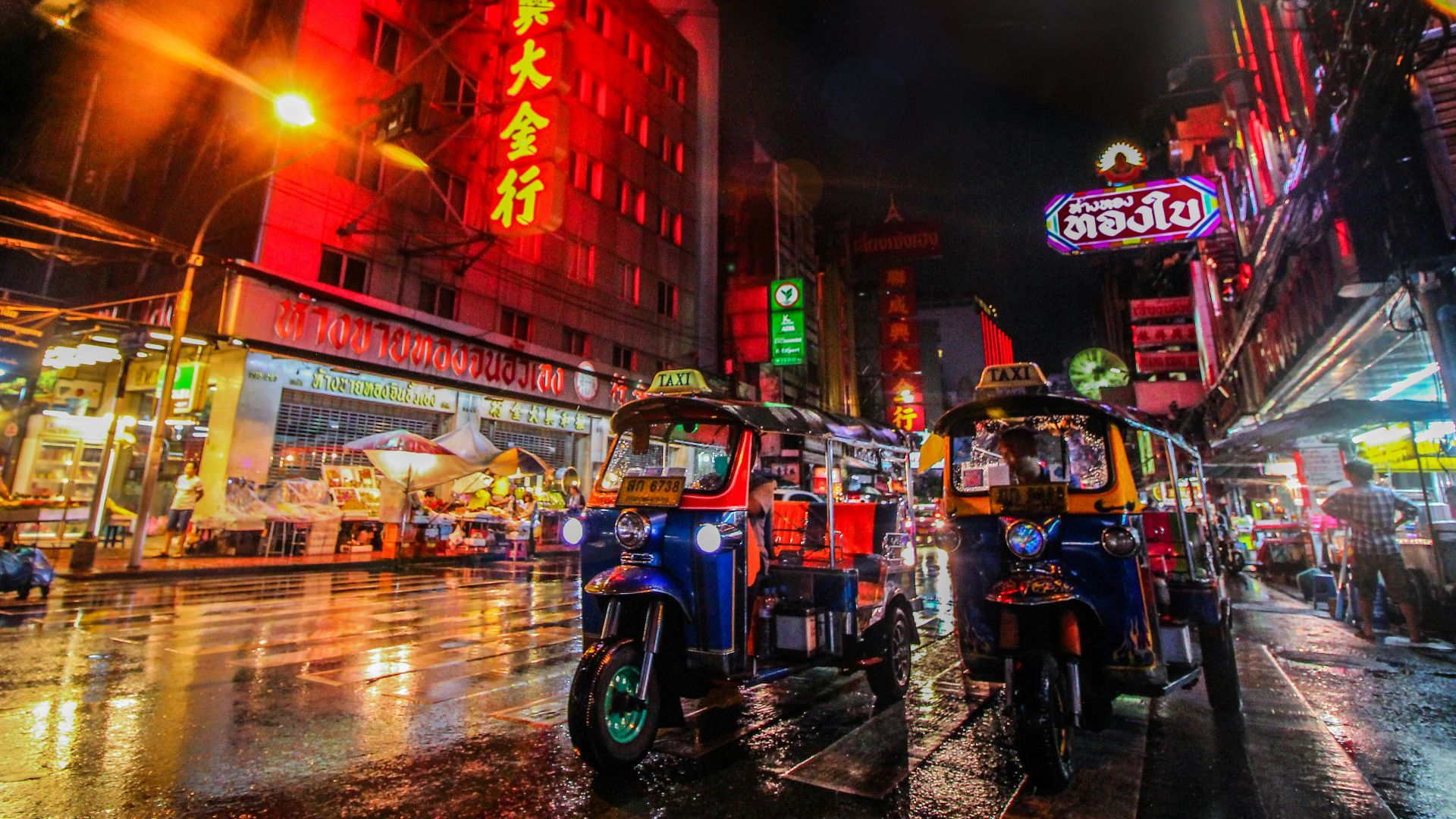 two auto rickshaw on the street