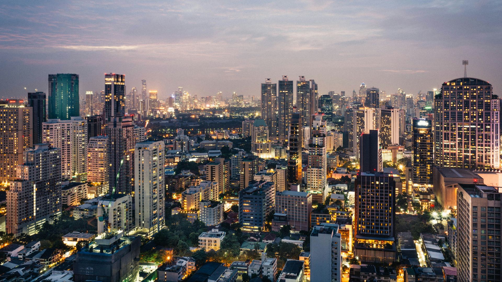 aerial photography of high-rise buildings under cloudy sky