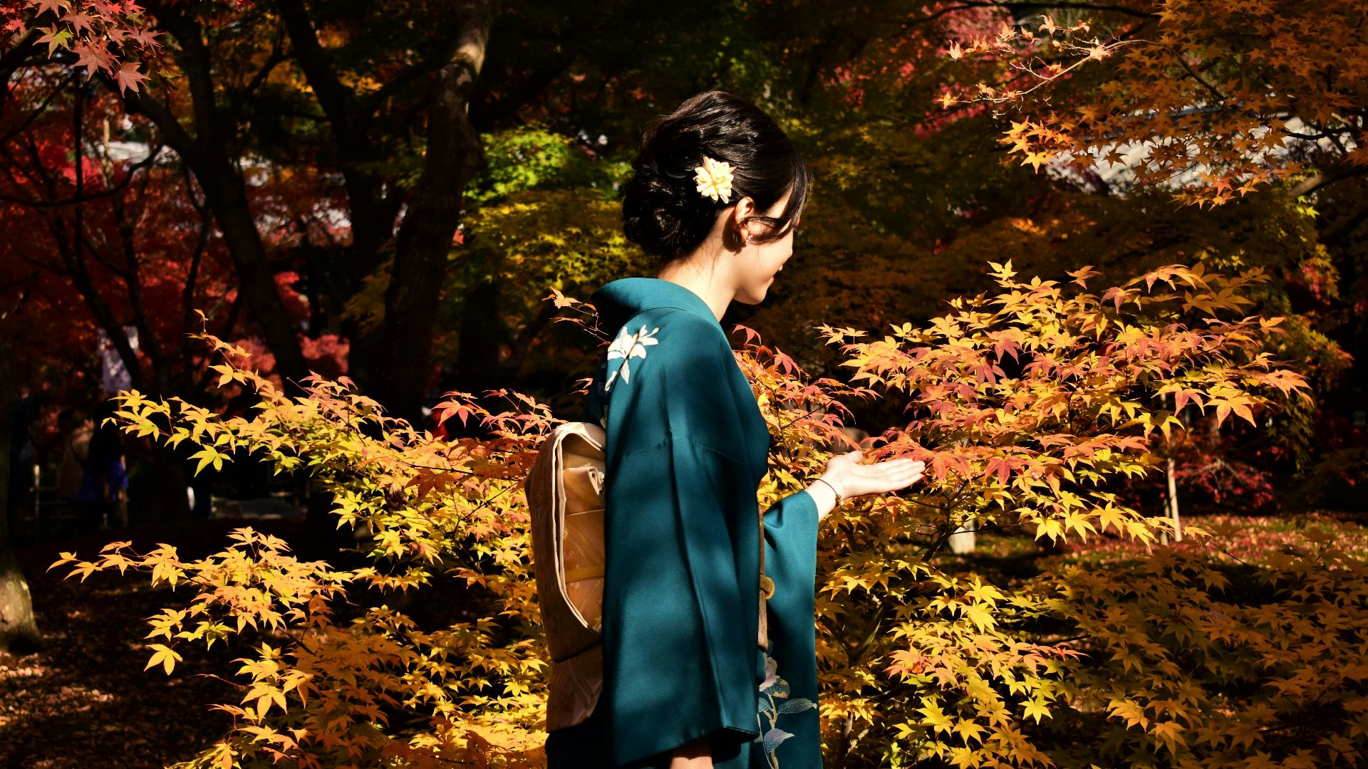 woman standing near the tre