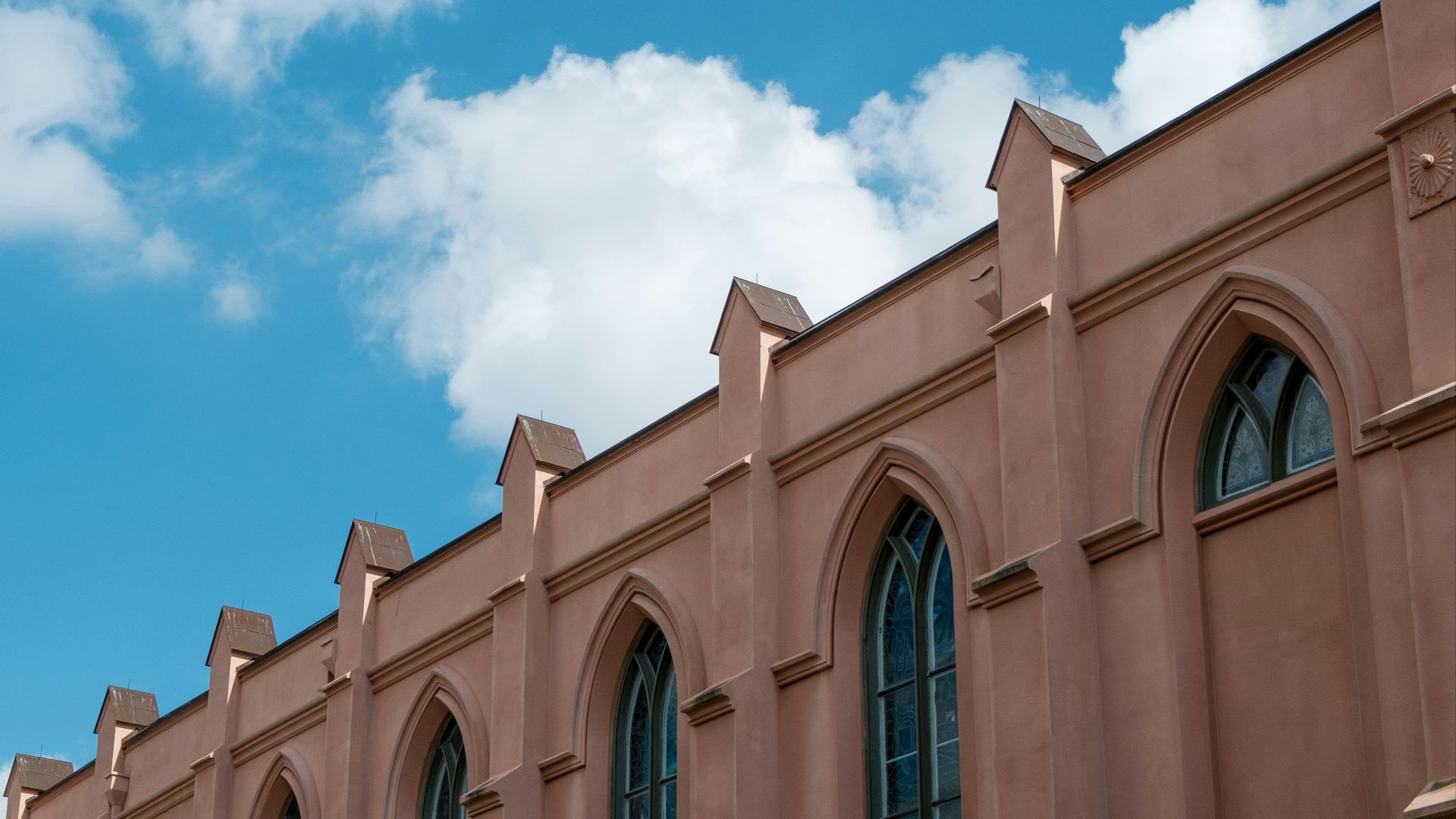 a building with a clock on the front of it