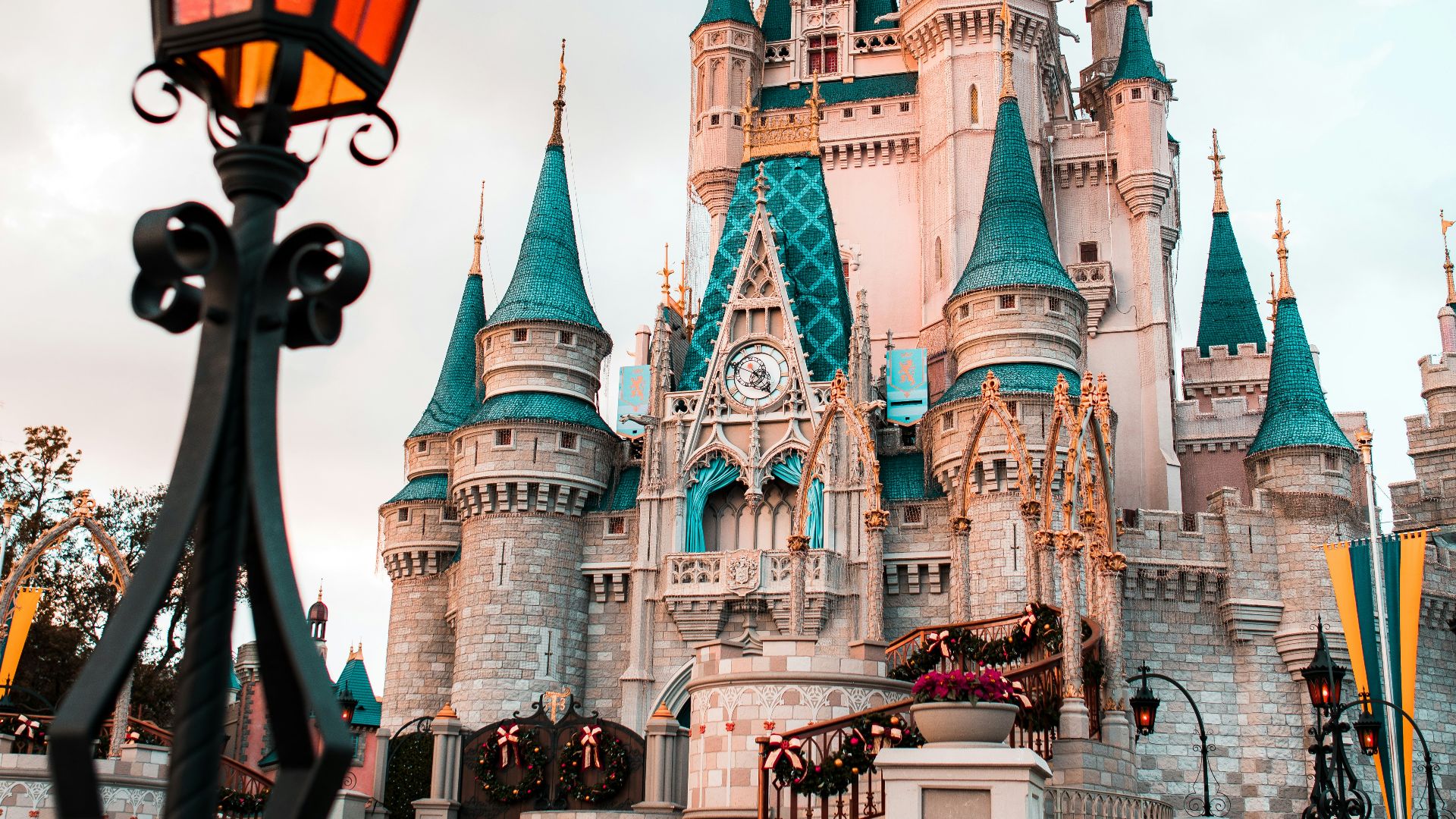 white and blue castle under cloudy sky during daytime