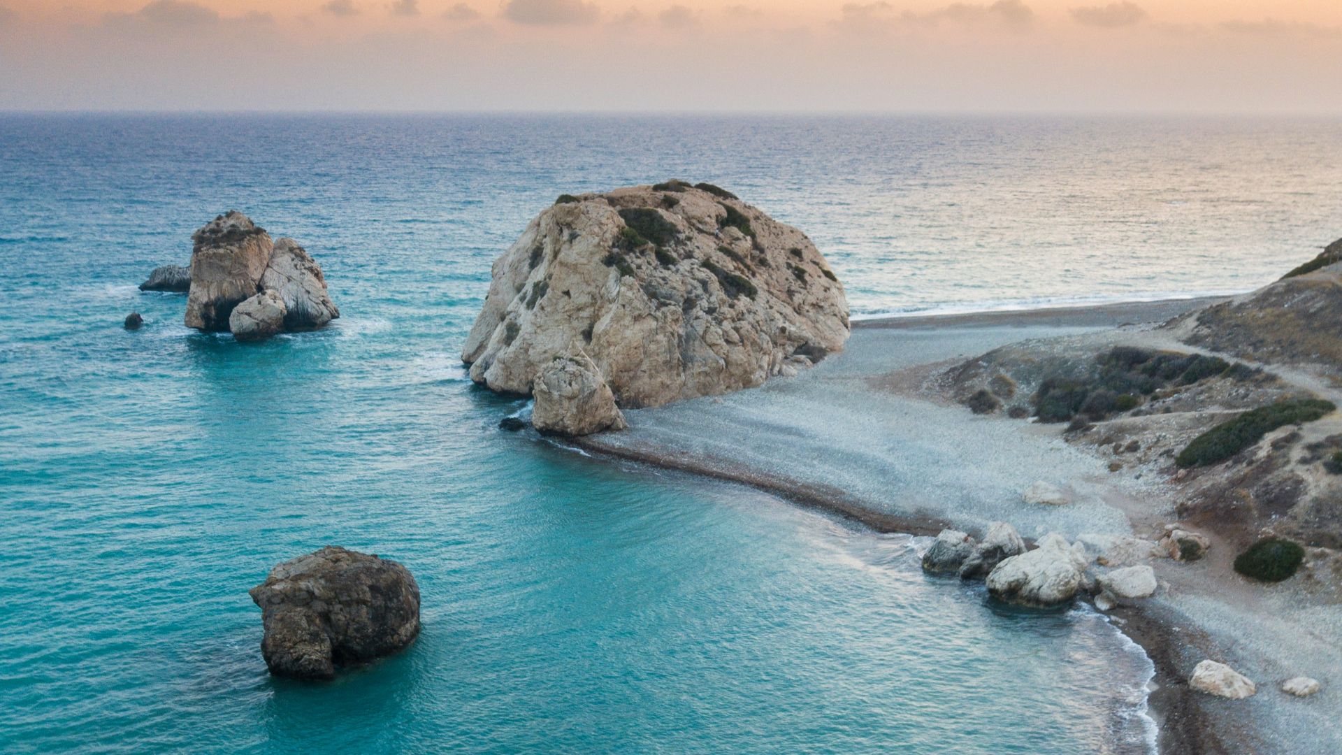 aerial photography of seashore beside body of water