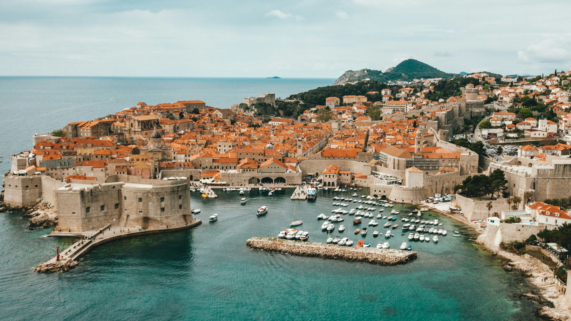 aerial view of buildings near ocean