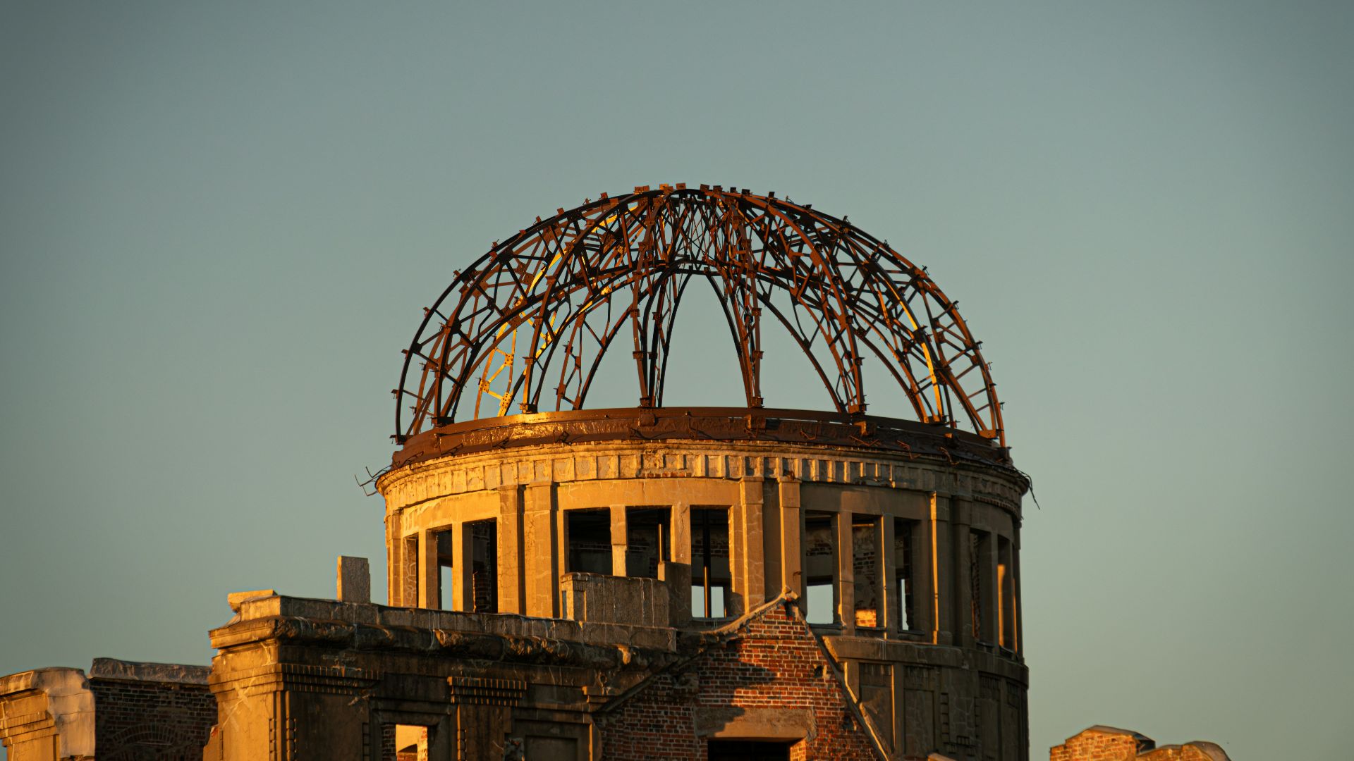 an old building with a rusted out dome on top