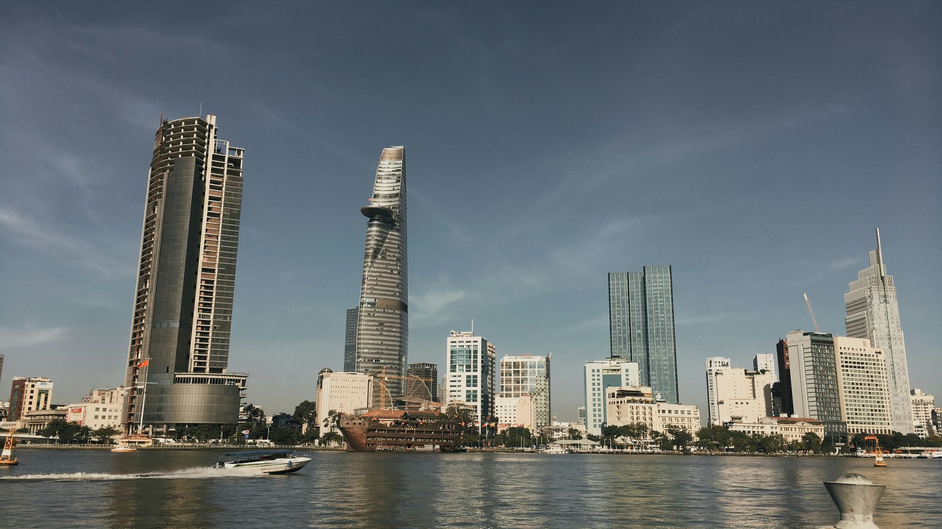 city skyline across body of water during daytime