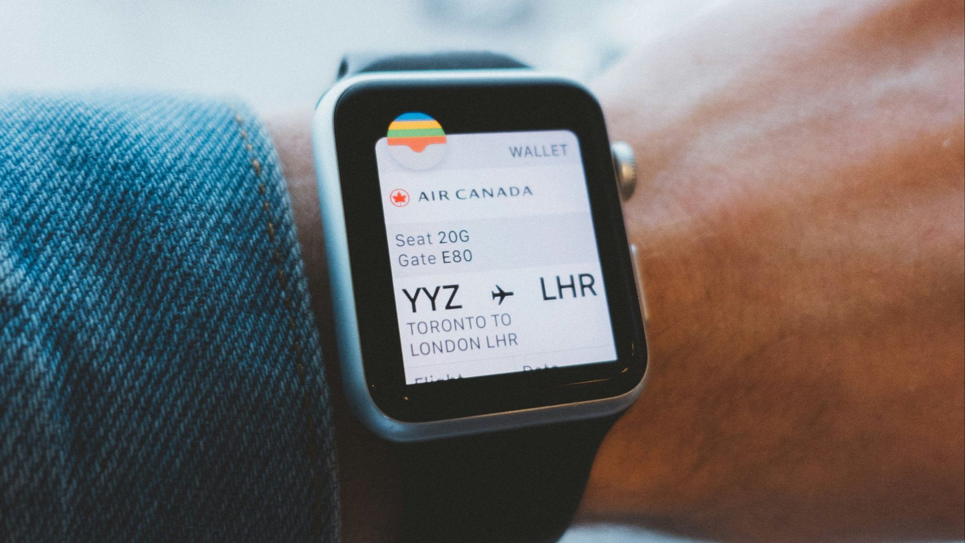 space gray aluminum case Apple Watch and black leather band turned on