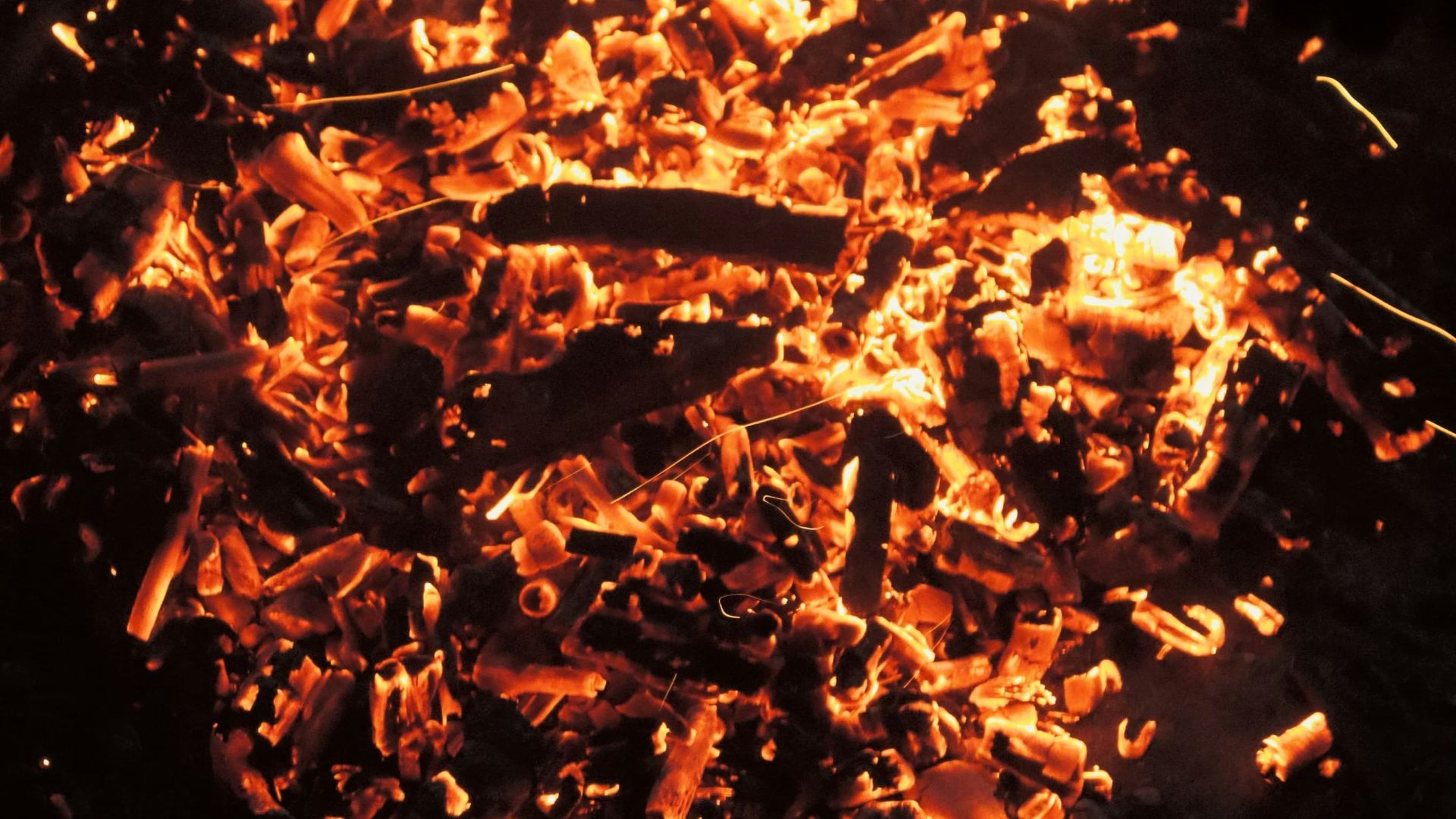 a pile of wood shavings sitting on top of a table