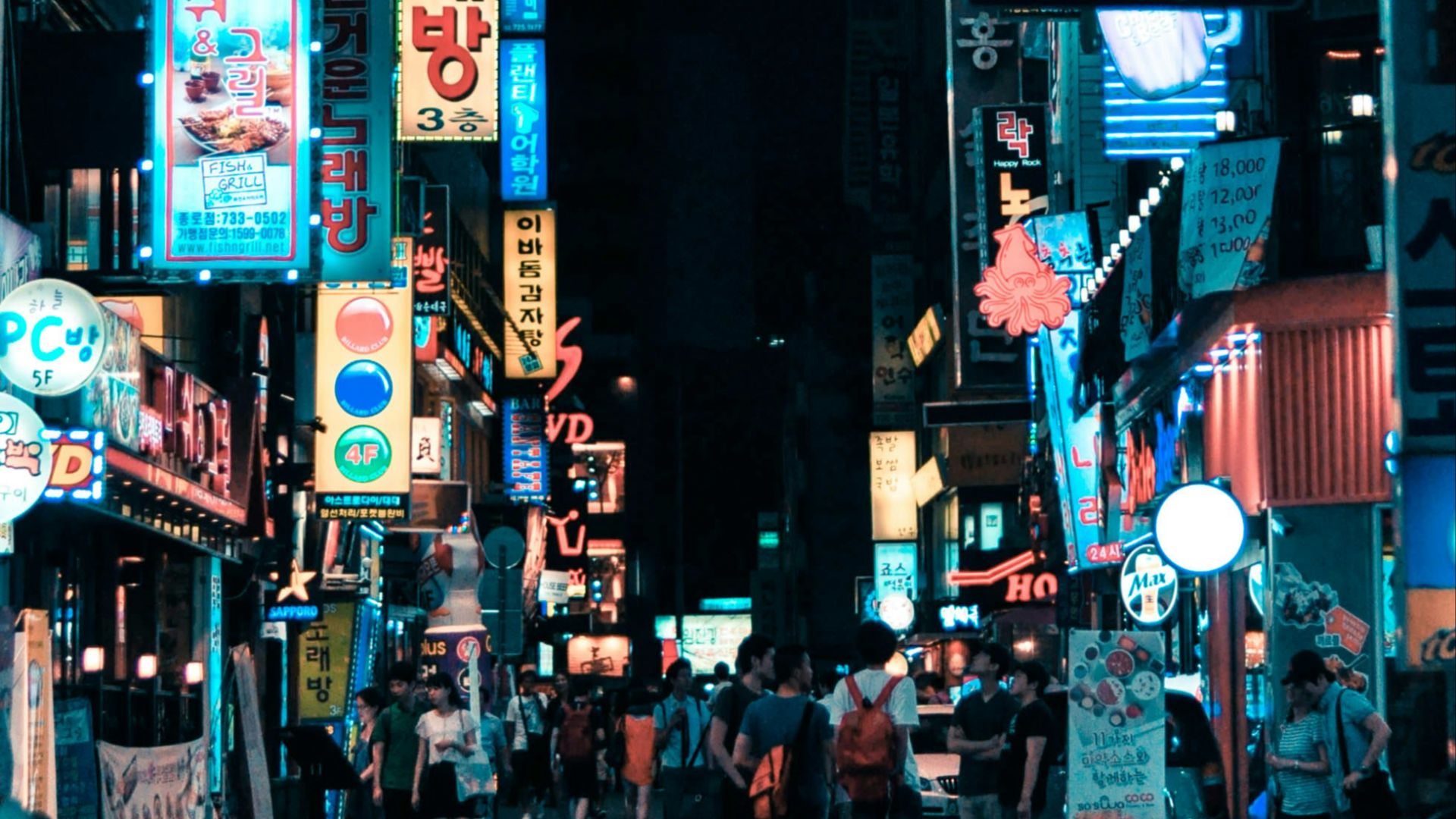 buildings with pathway surround by people