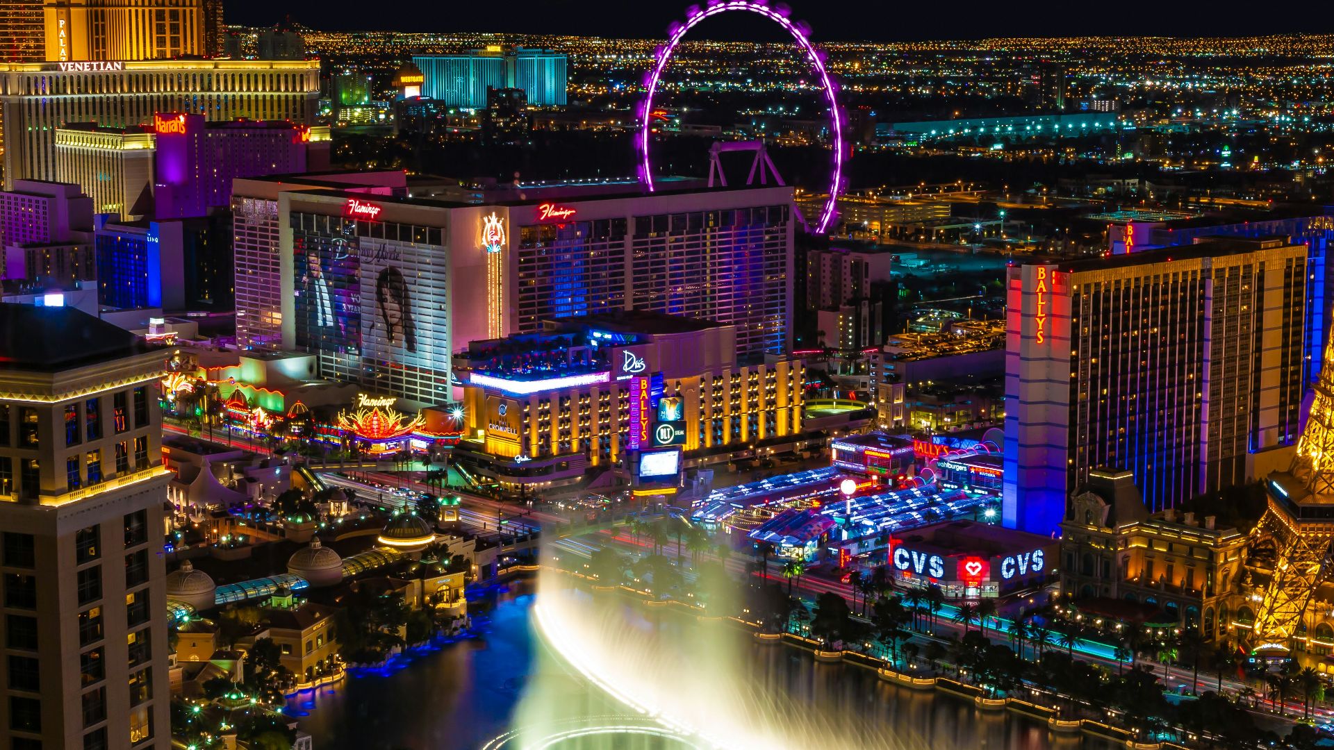 city with lights turned on during night time