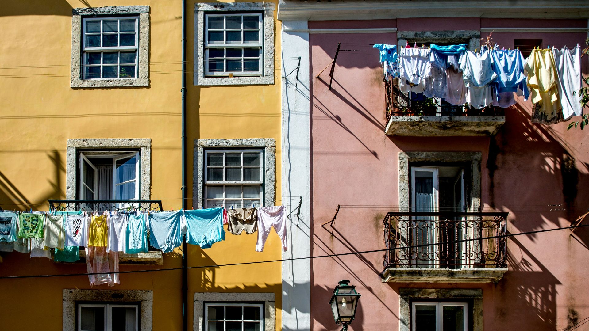 a couple of buildings that have clothes hanging out to dry
