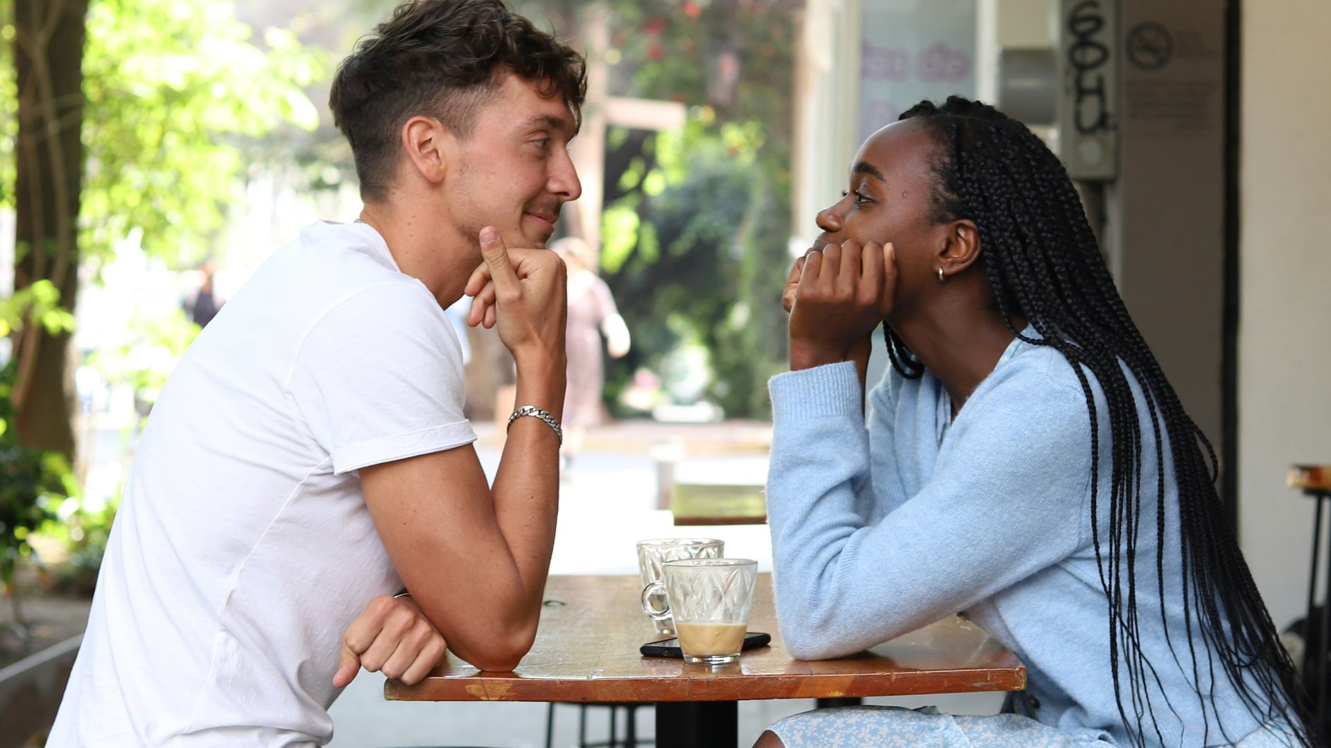 a man and a woman sitting at a table