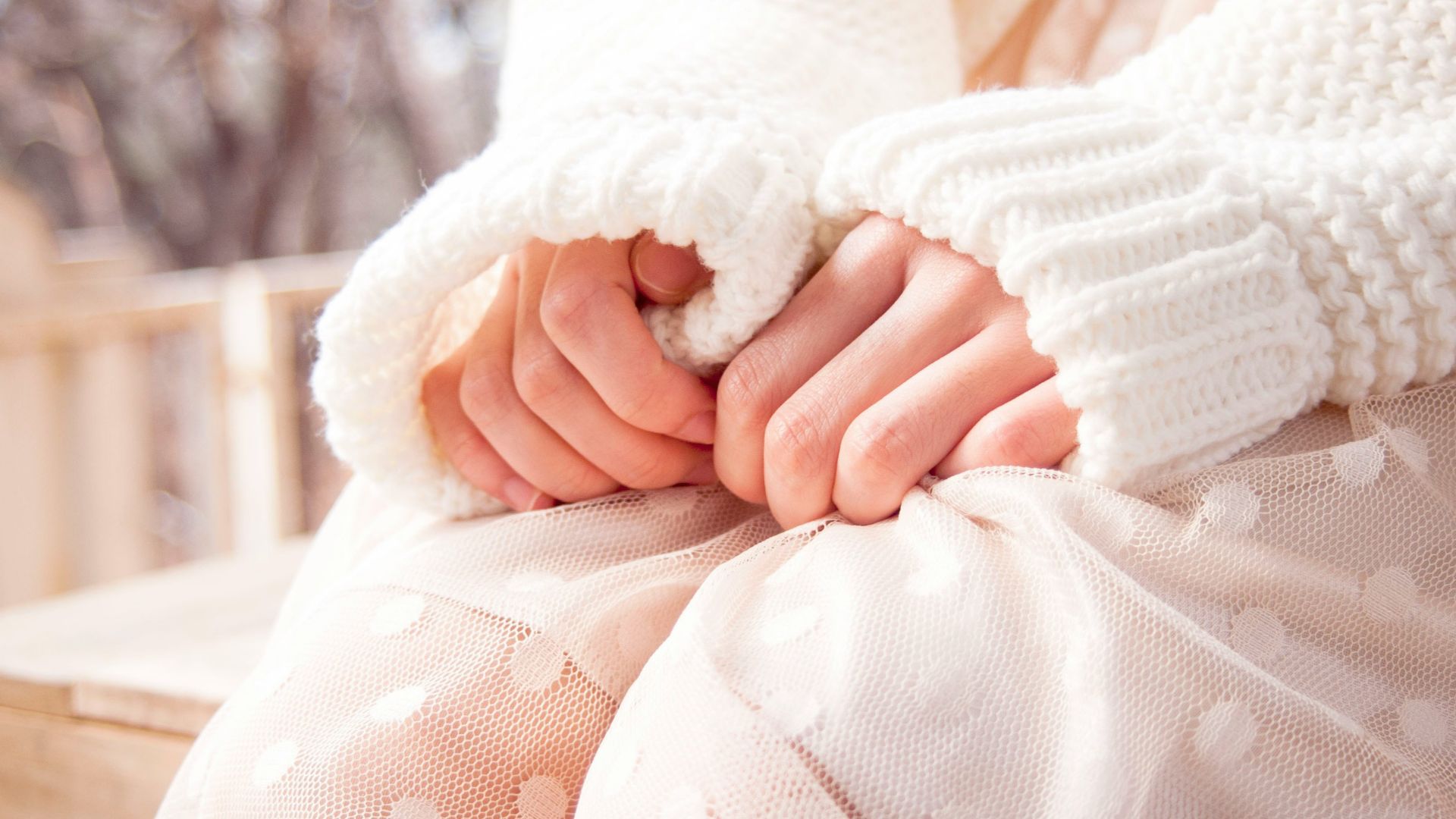 person resting hand on hip