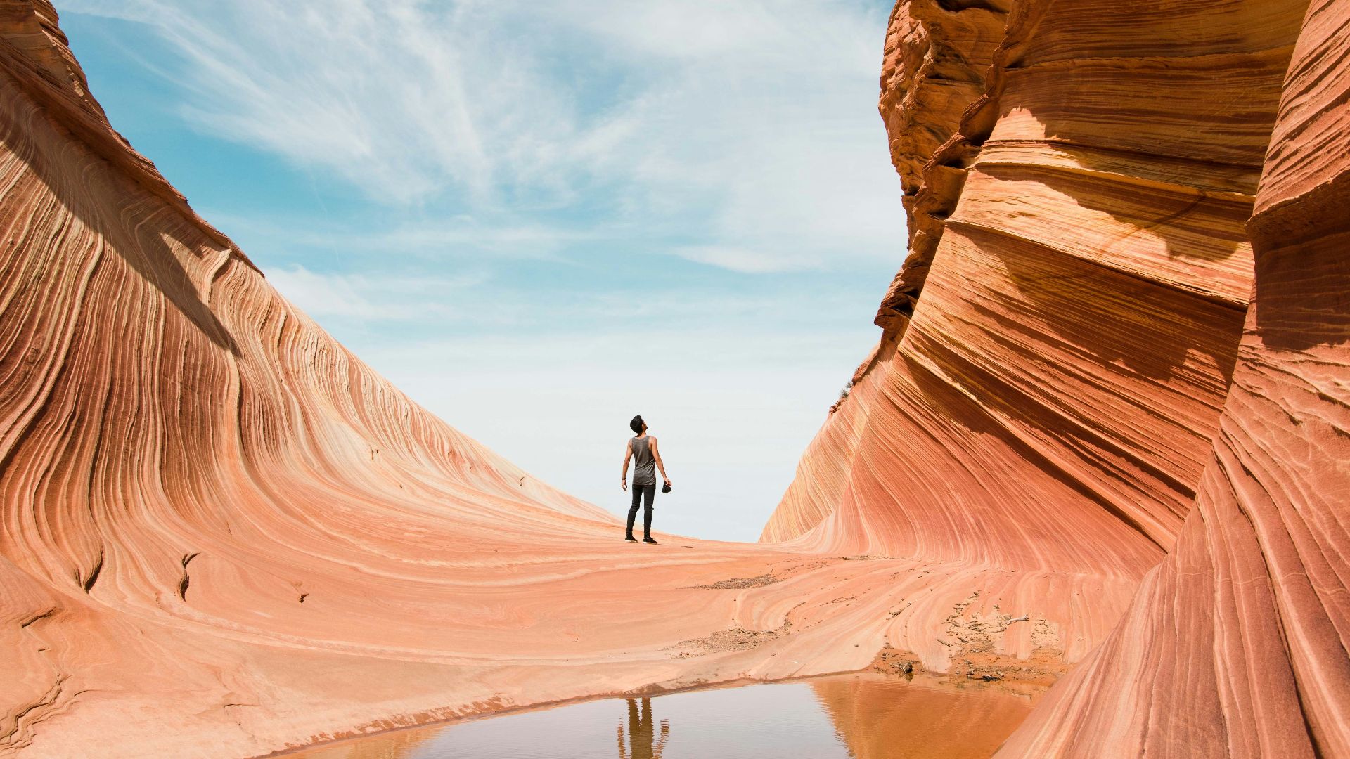 man on antelope canyon during daytime