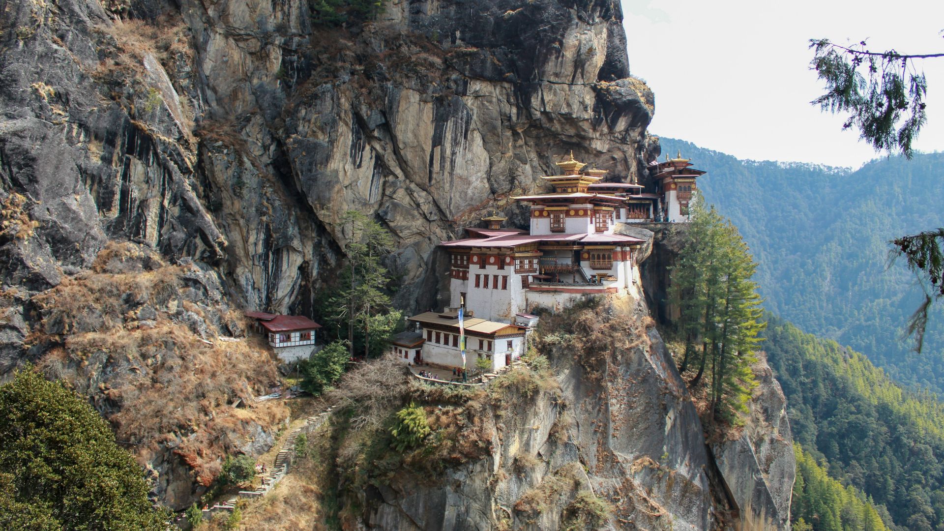Tigers nest monastery in bhutan, perched on a cliff.