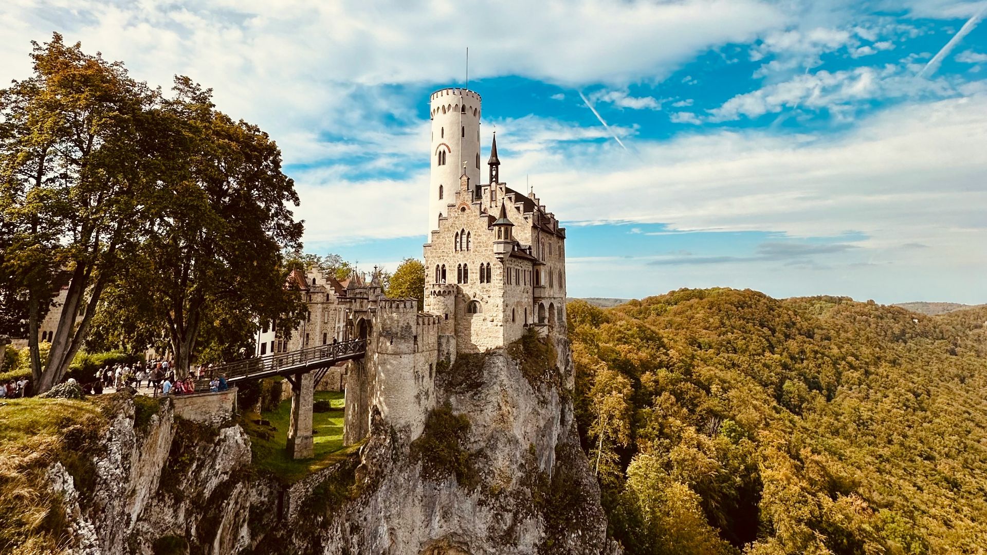 a castle sitting on top of a cliff