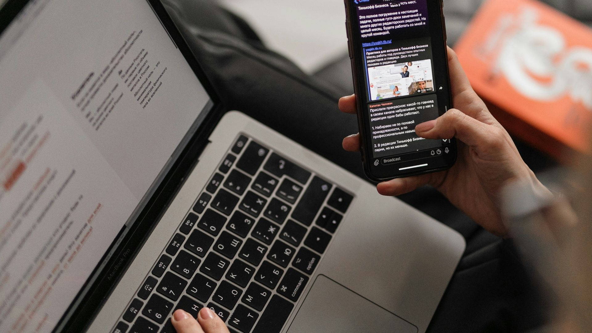 person holding black iphone 4