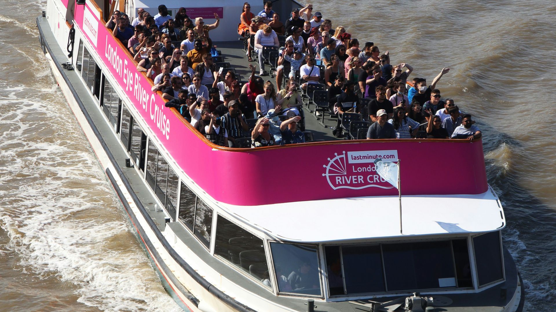 a group of people on a boat in the water