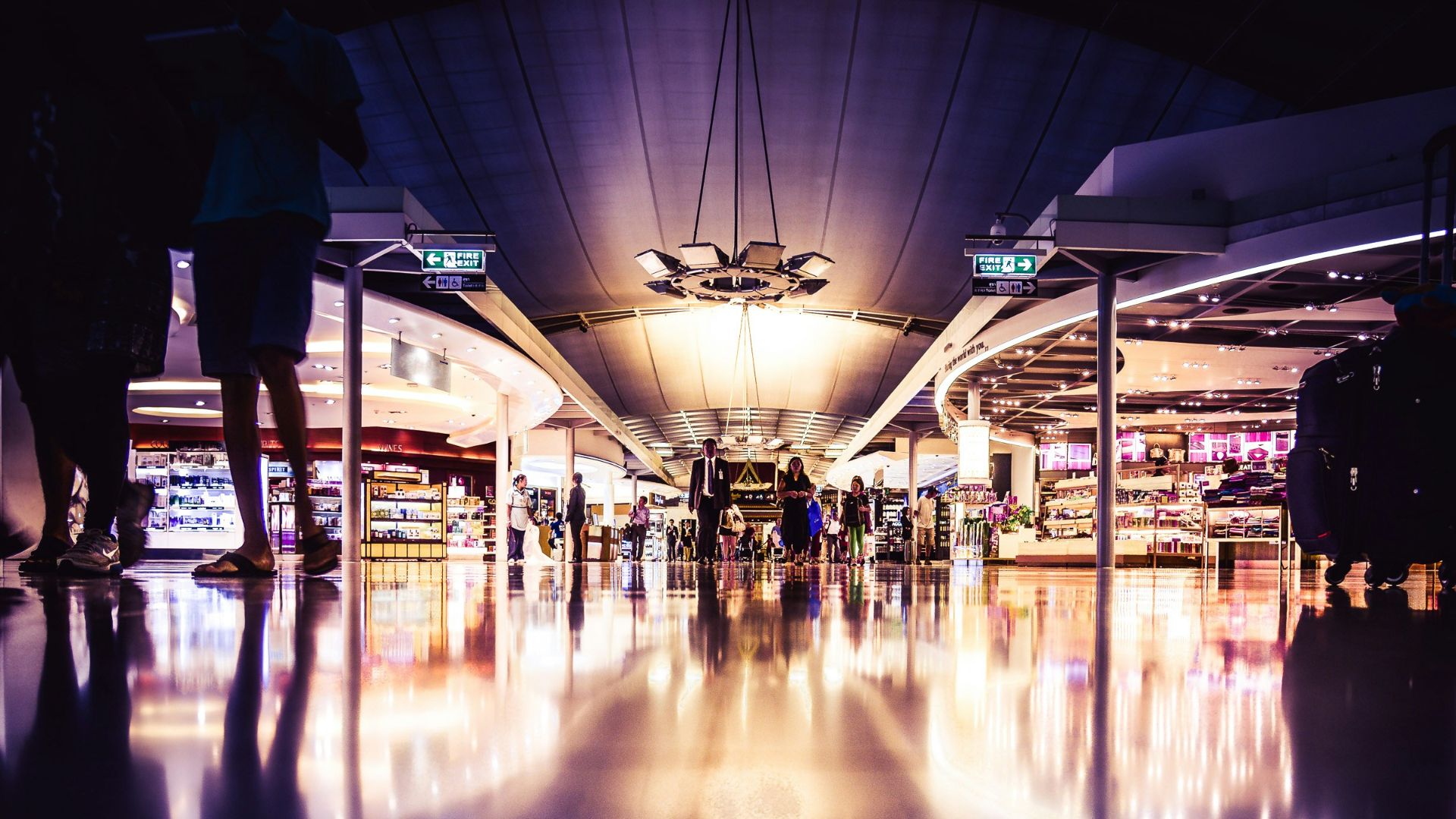 people standing on lighted room
