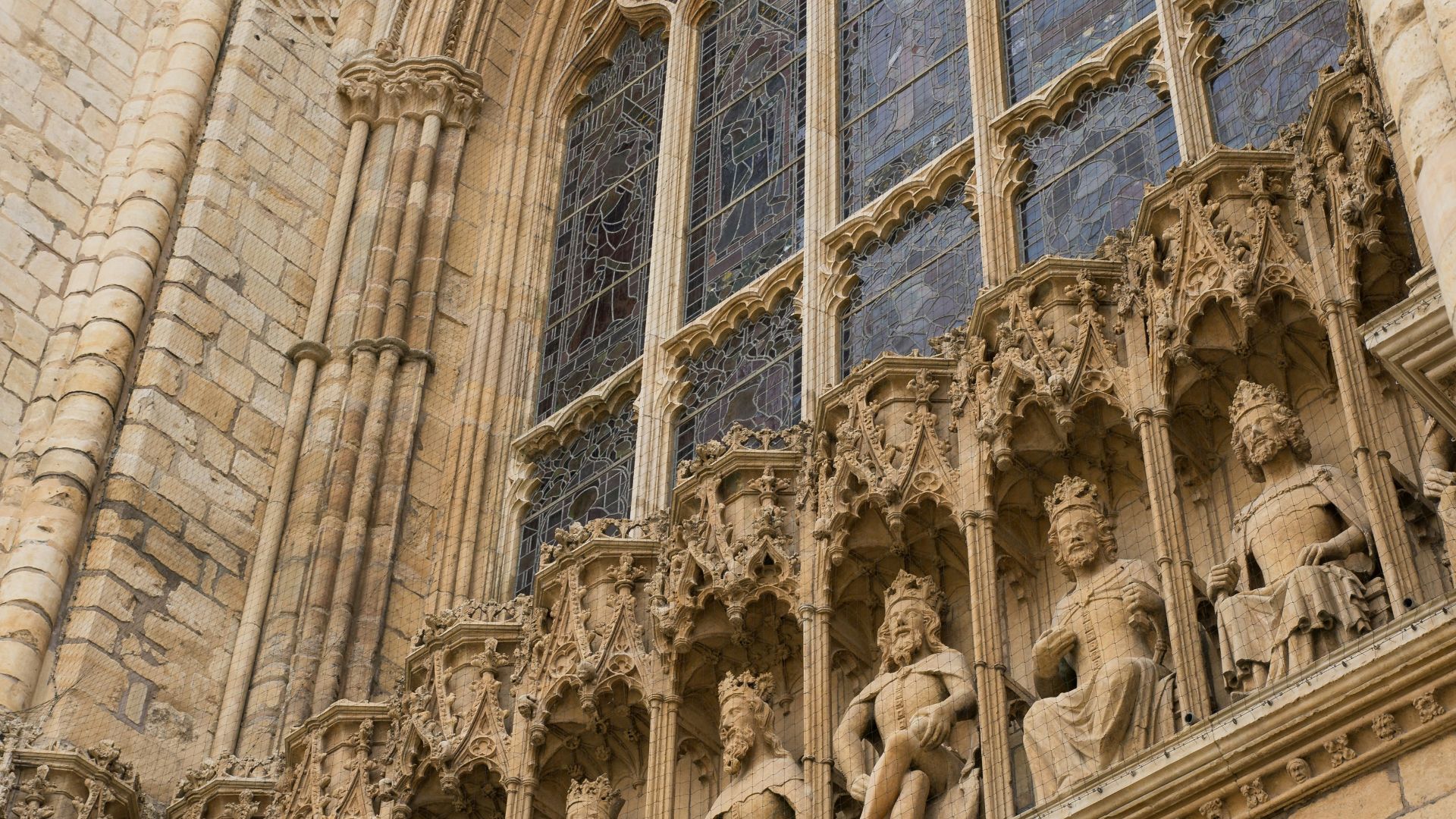a tall building with a clock on the front of it