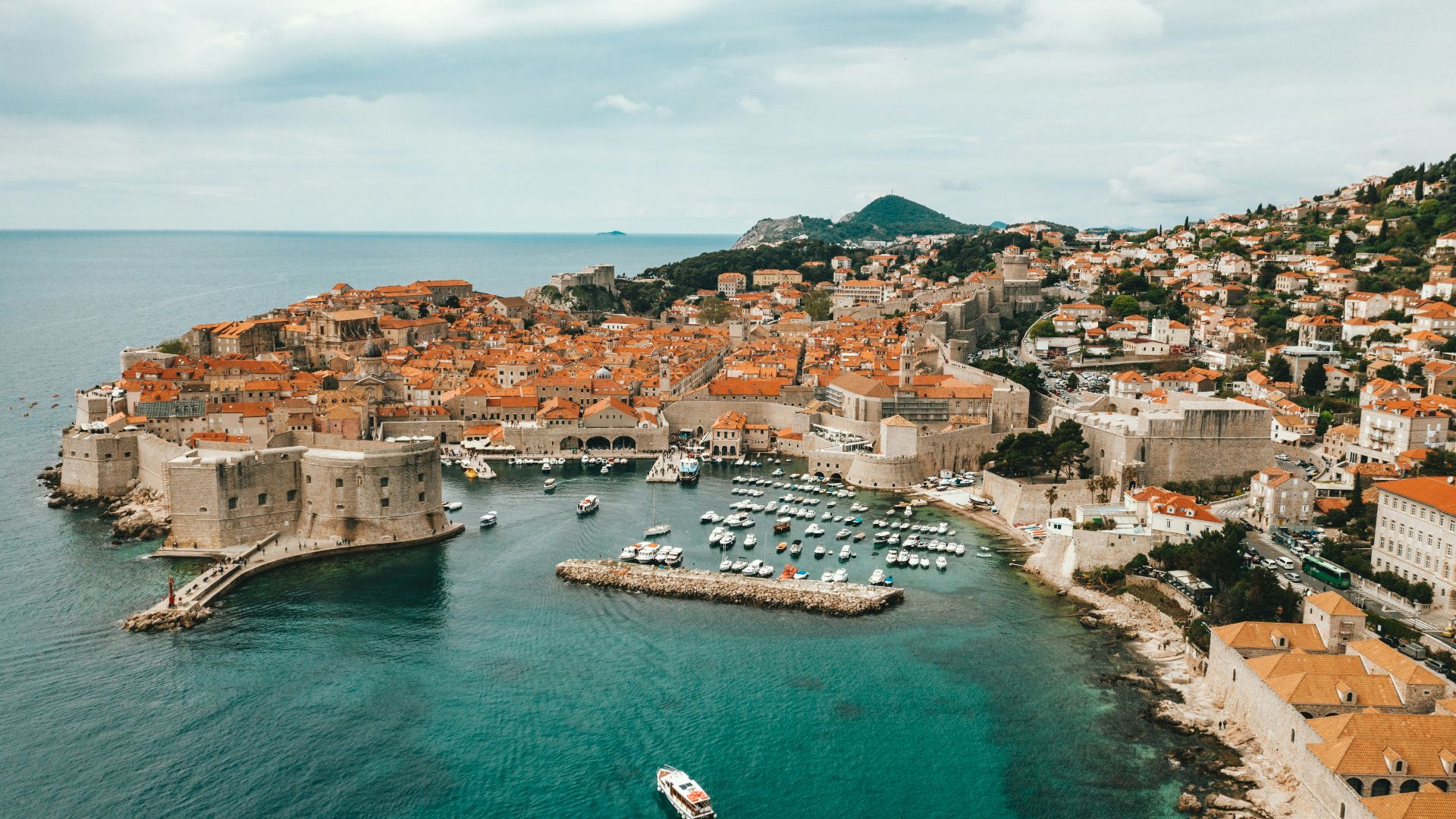 aerial view of buildings near ocean