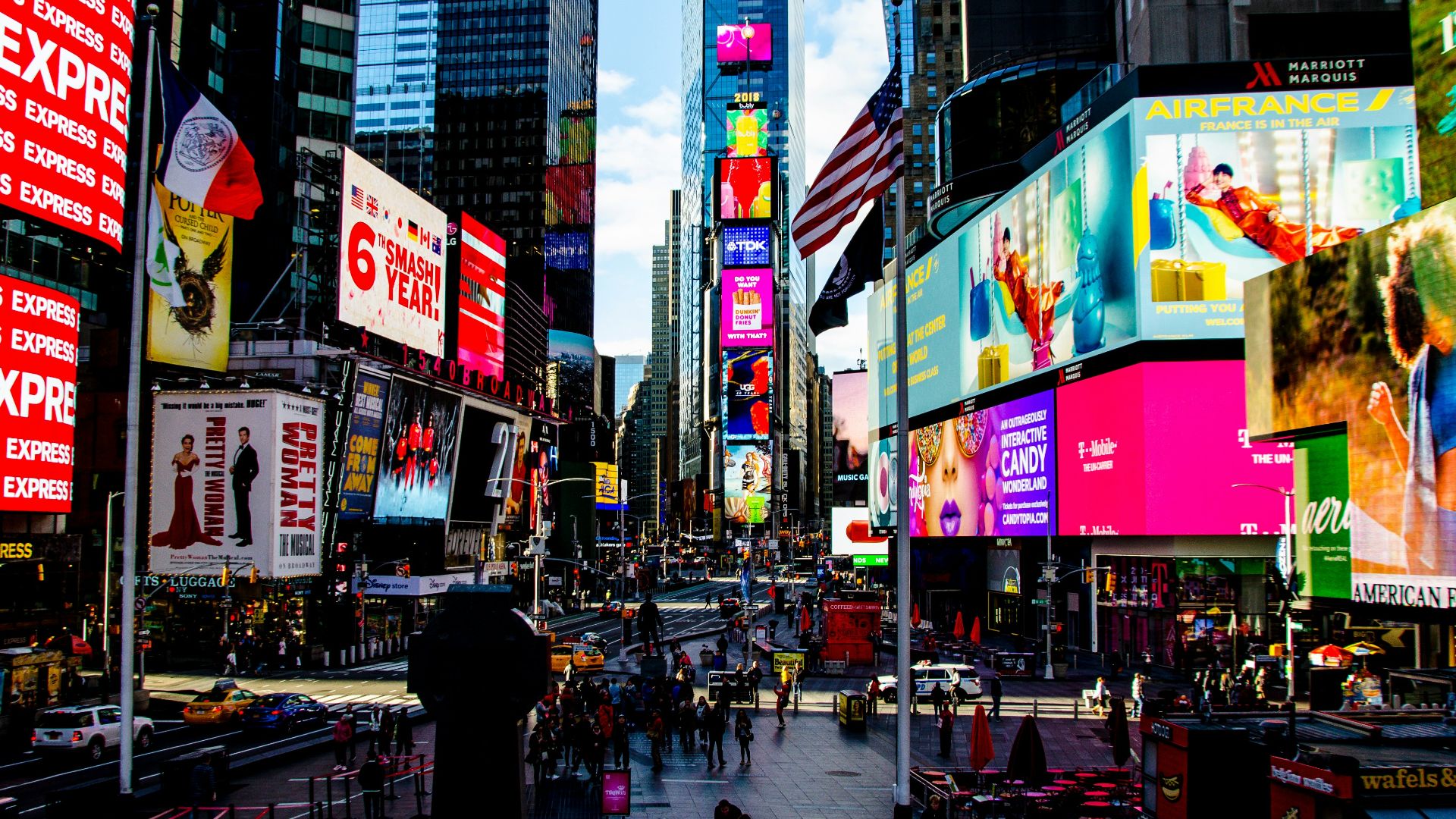 group of people walking near high-rise buildings