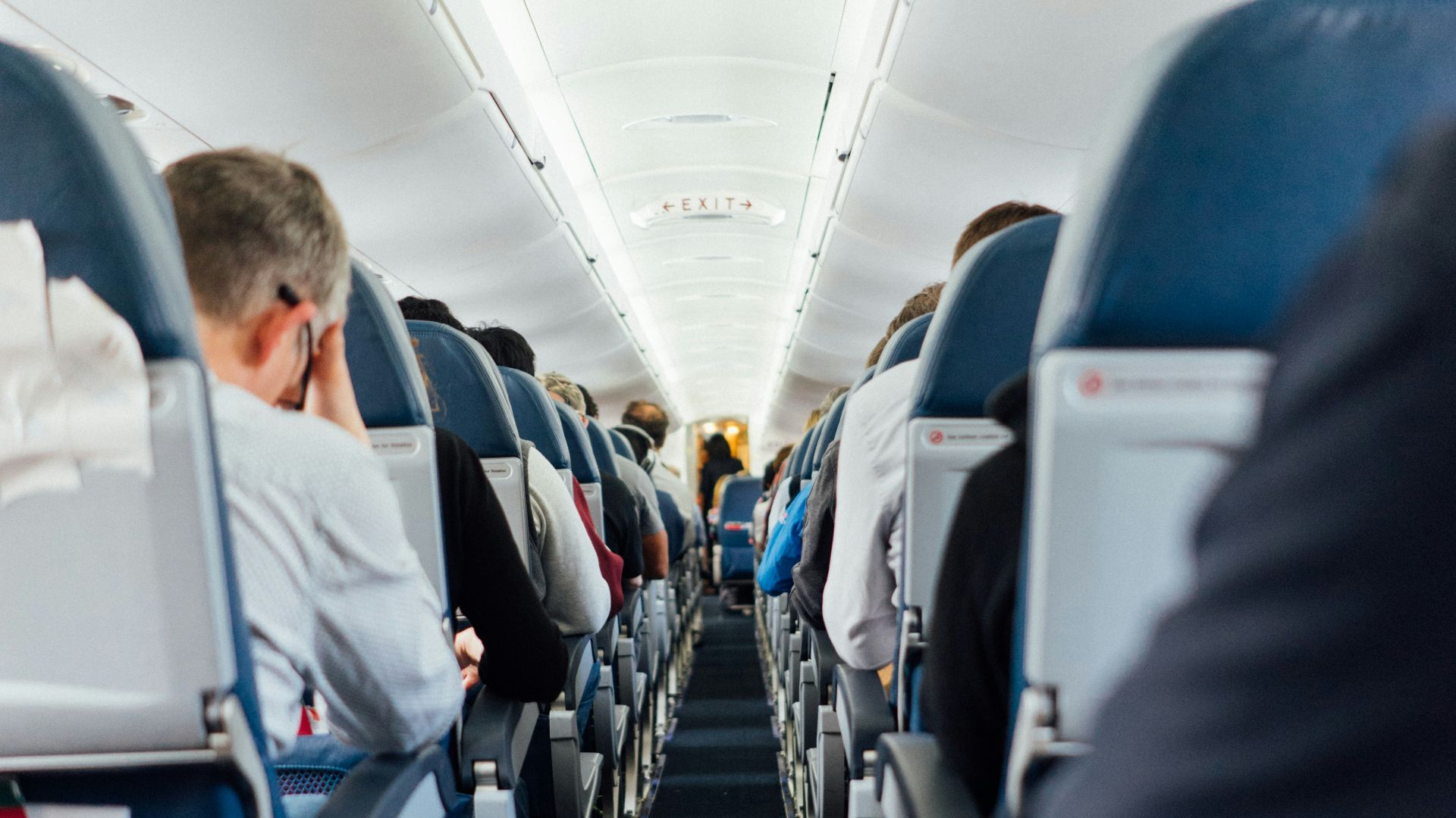 people sitting inside plane
