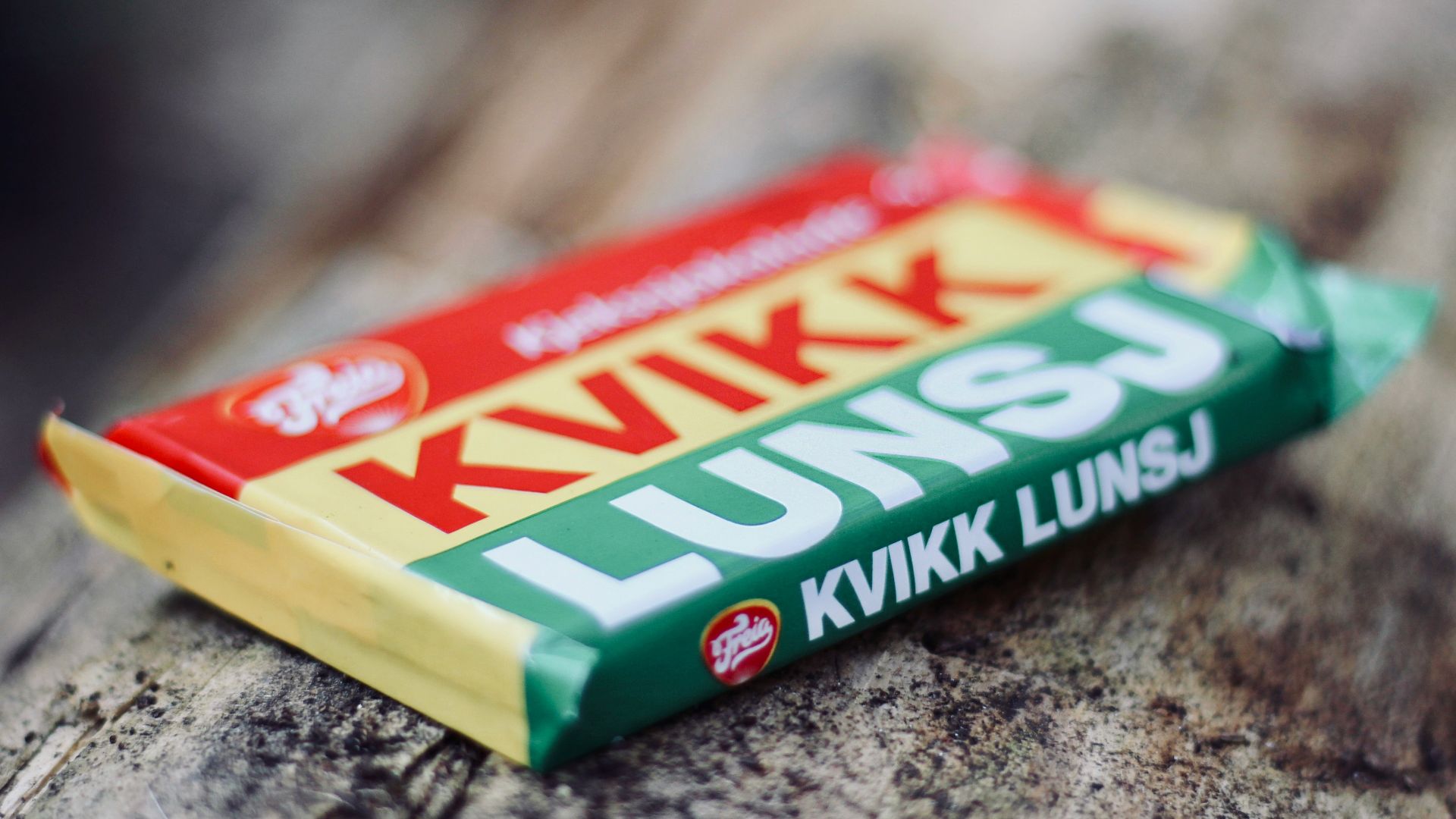 green and yellow box on gray and black marble table