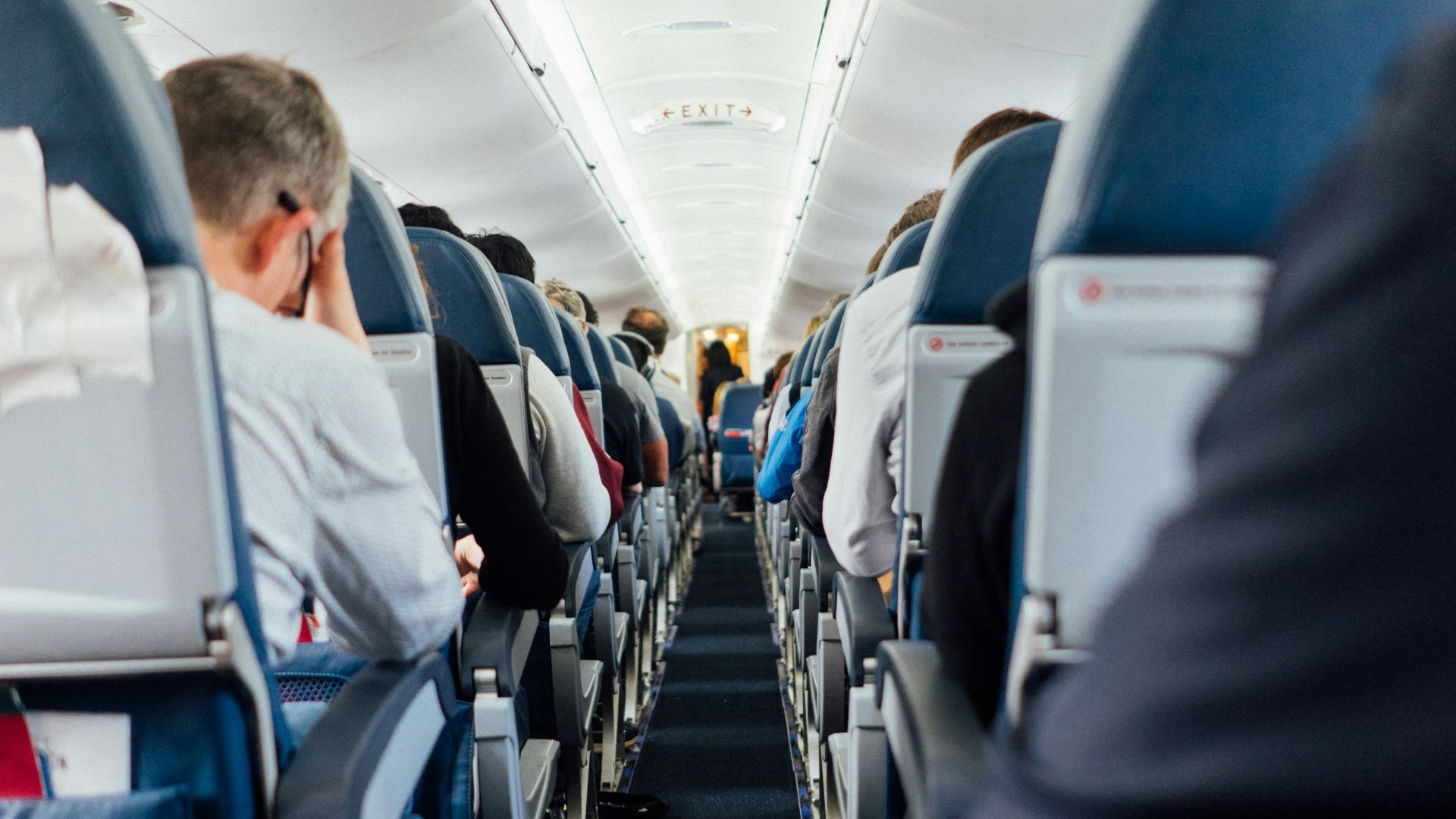 people sitting inside plane