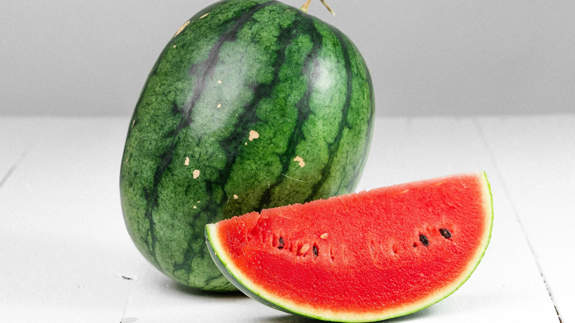 watermelon fruit on white table