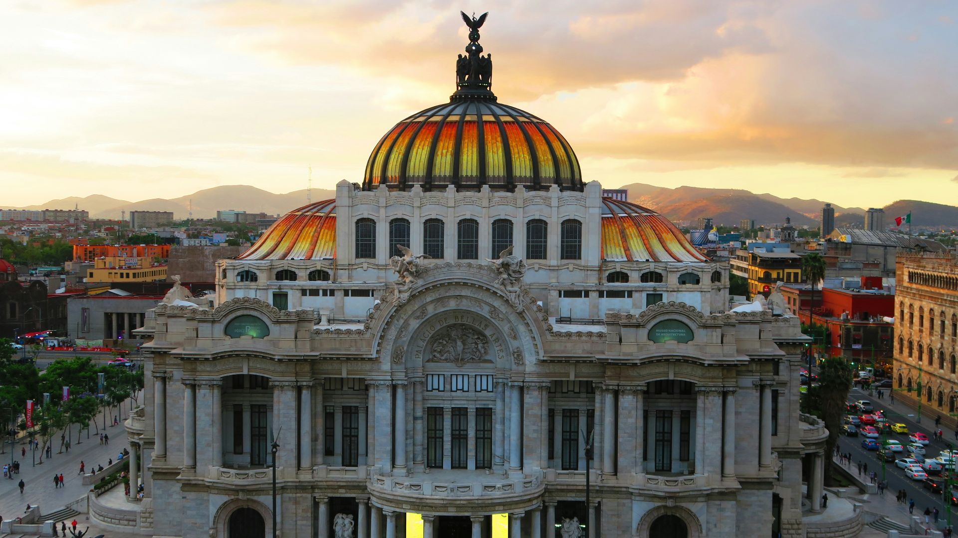 people gathered around gray concrete building