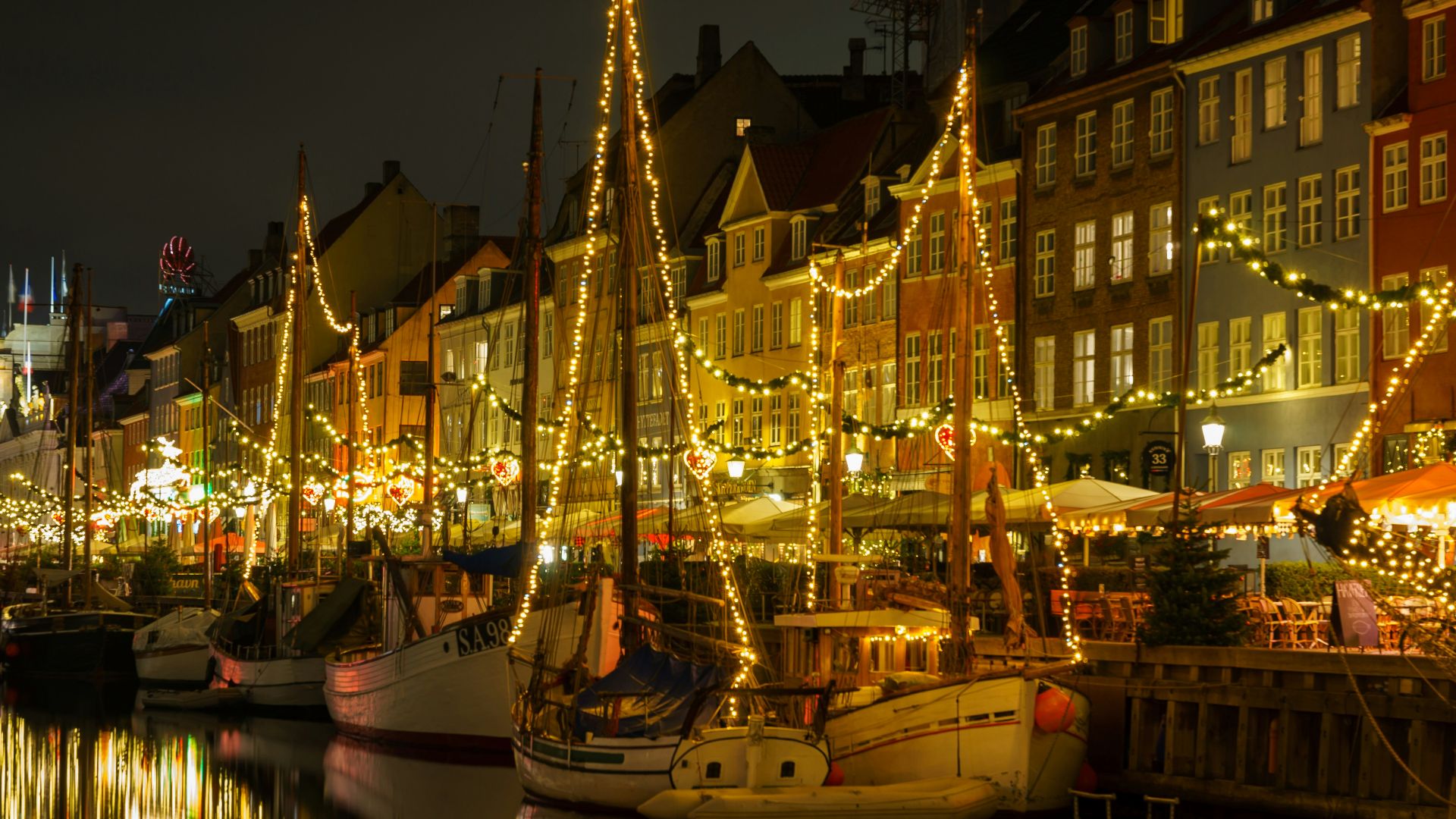 white and black boat on water during night time