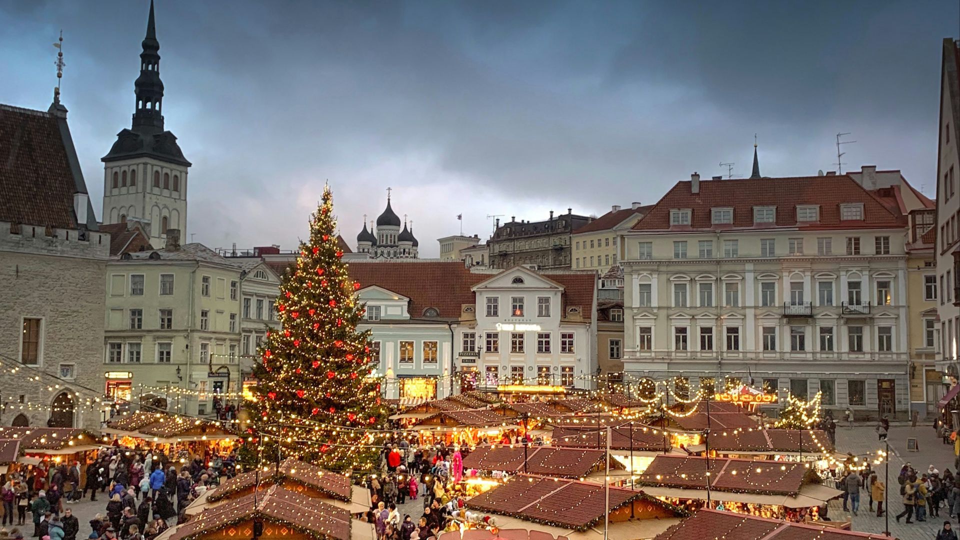 people walking on street near buildings during daytime