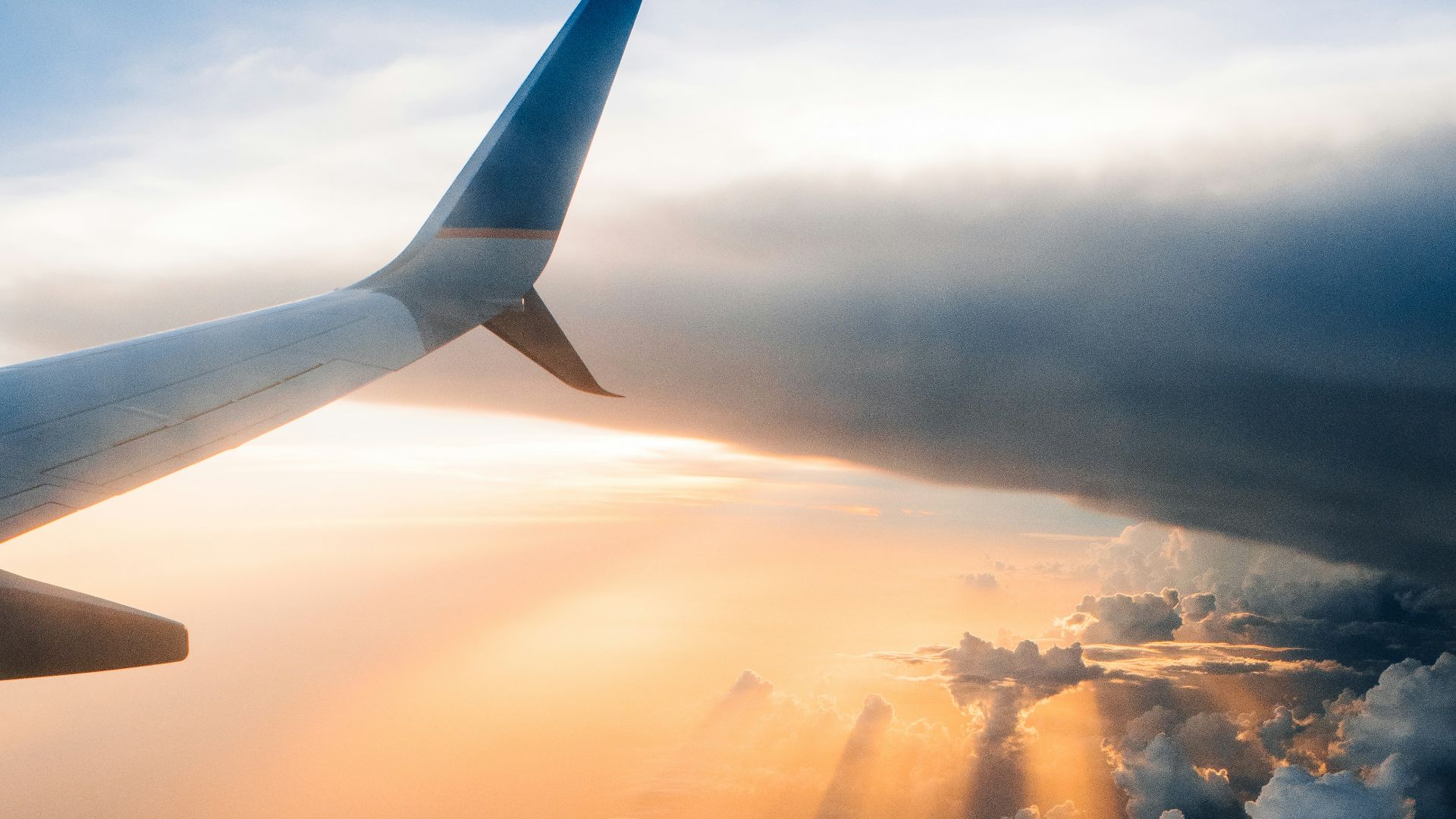airplane on sky during golden hour