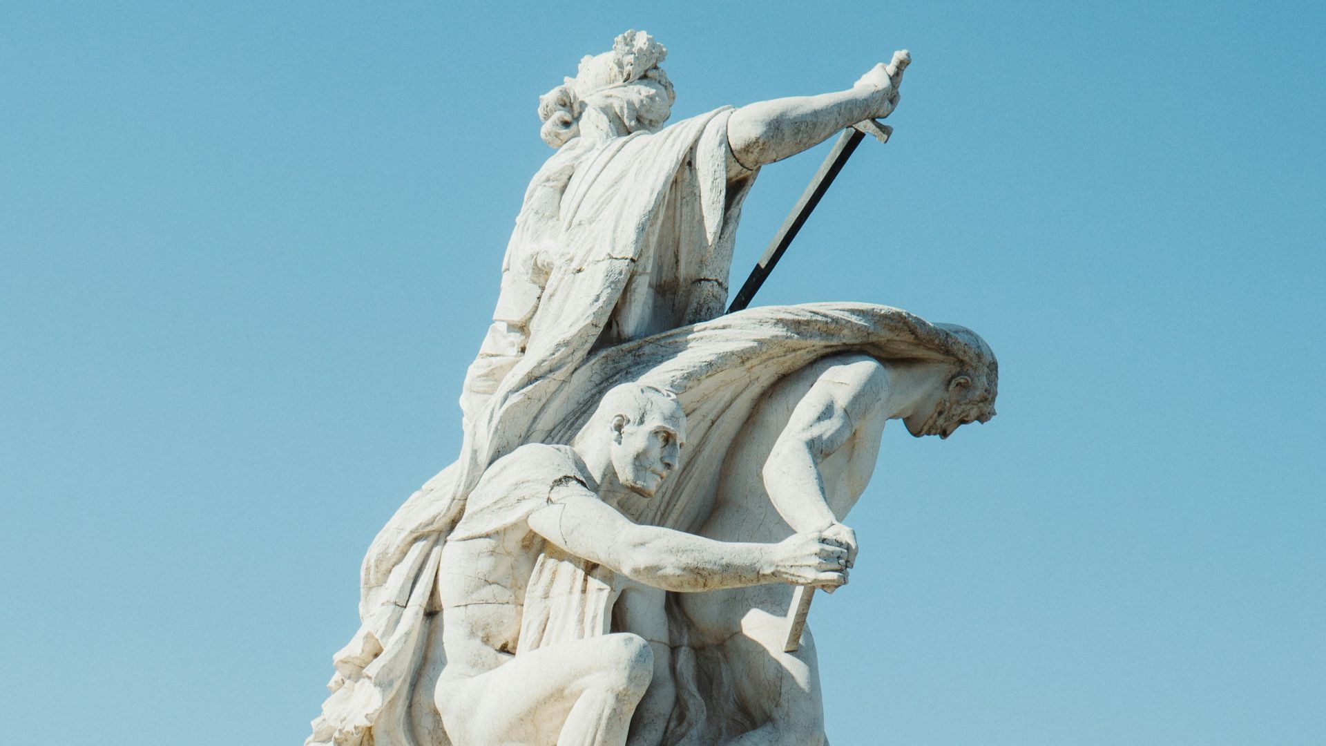 a statue of a person riding a horse