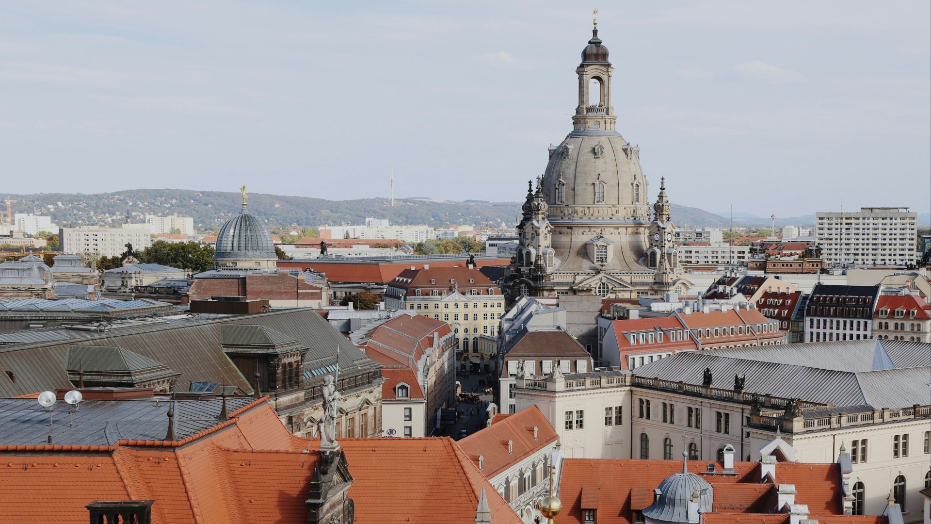 a view of a city from the top of a building