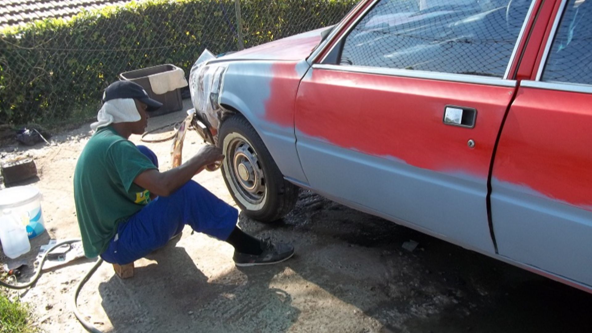 File:Justice mask taping rims another stage of prparation to spray paint.jpg