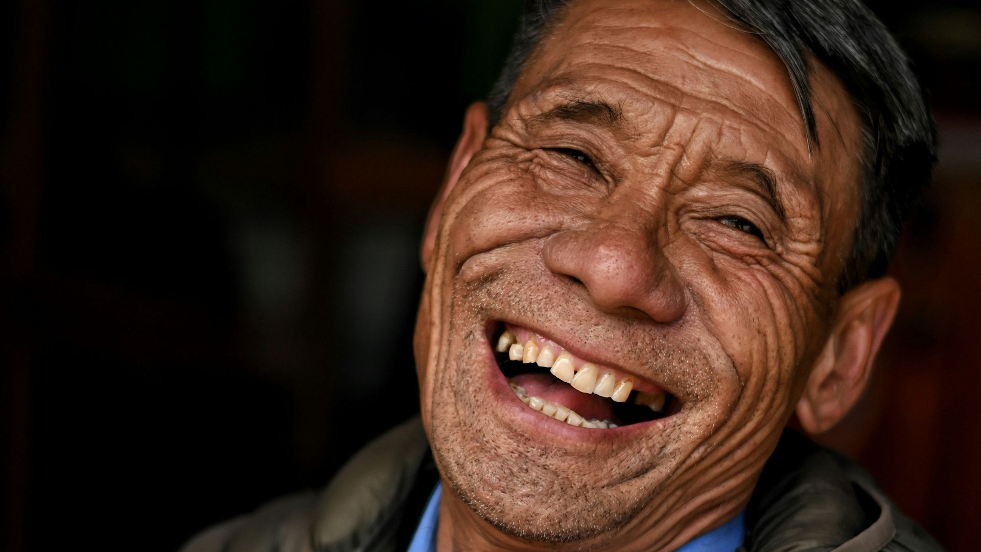 a man with his eyes closed