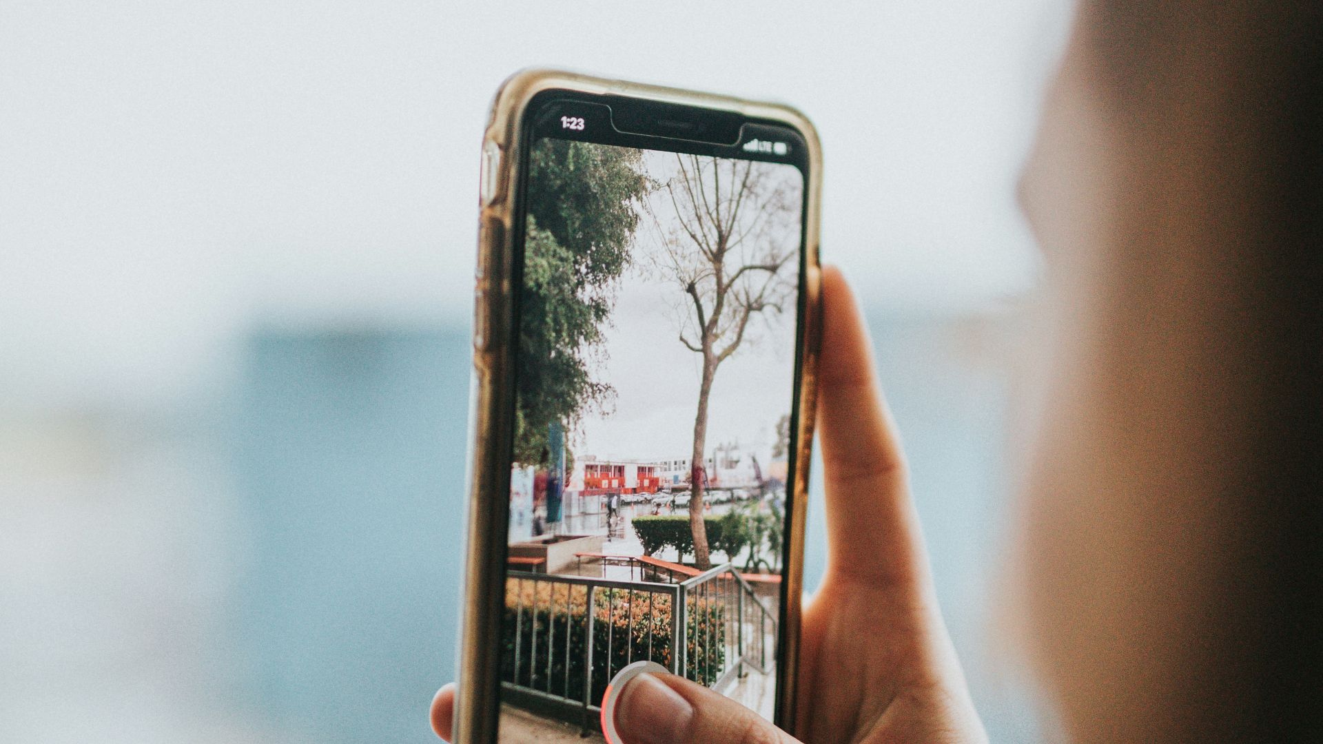 person holding silver iphone 6