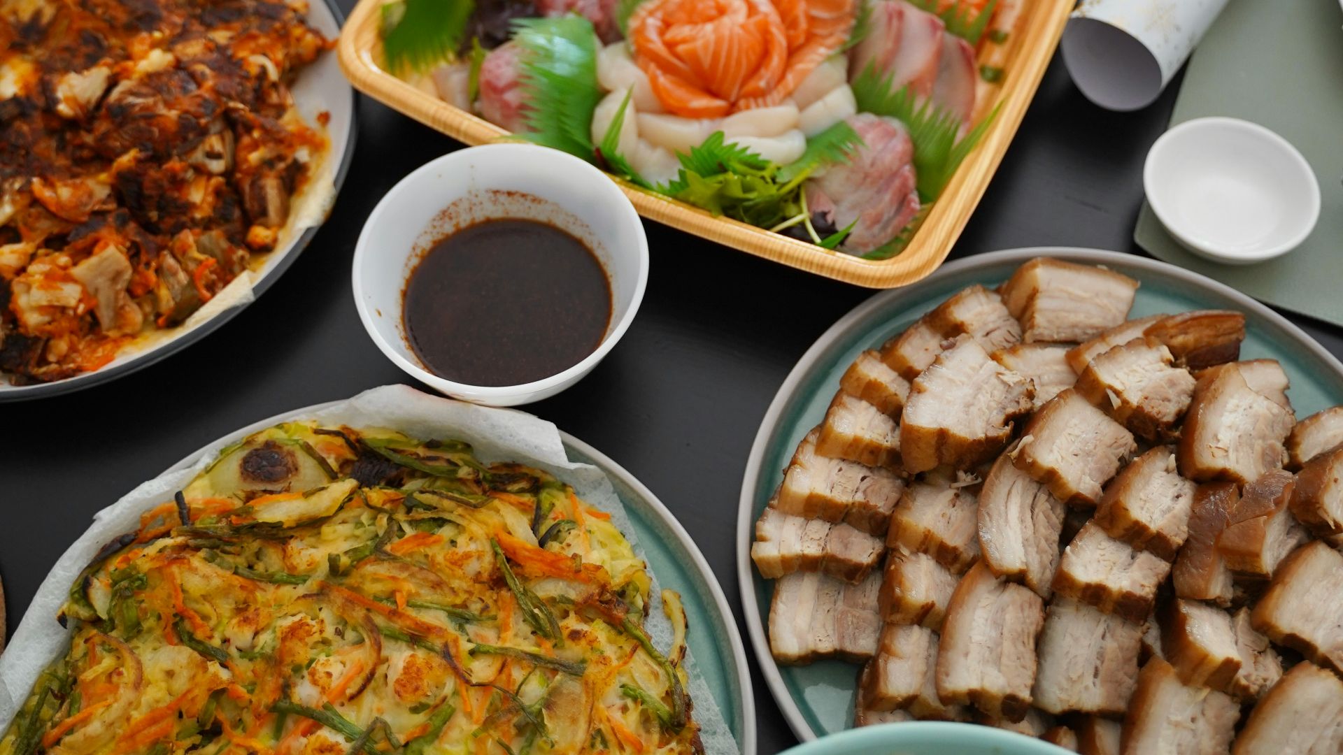 A table full of different types of food