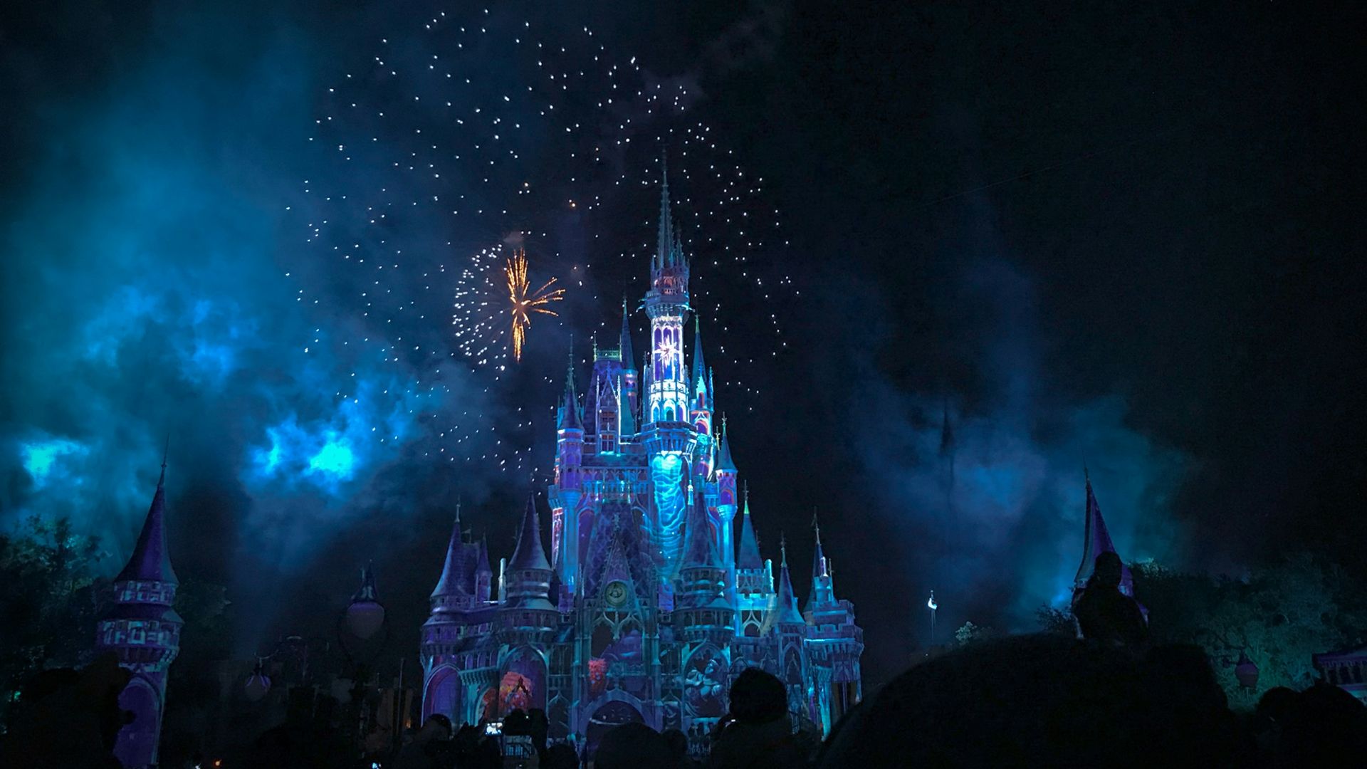 crystal castle with fireworks at night