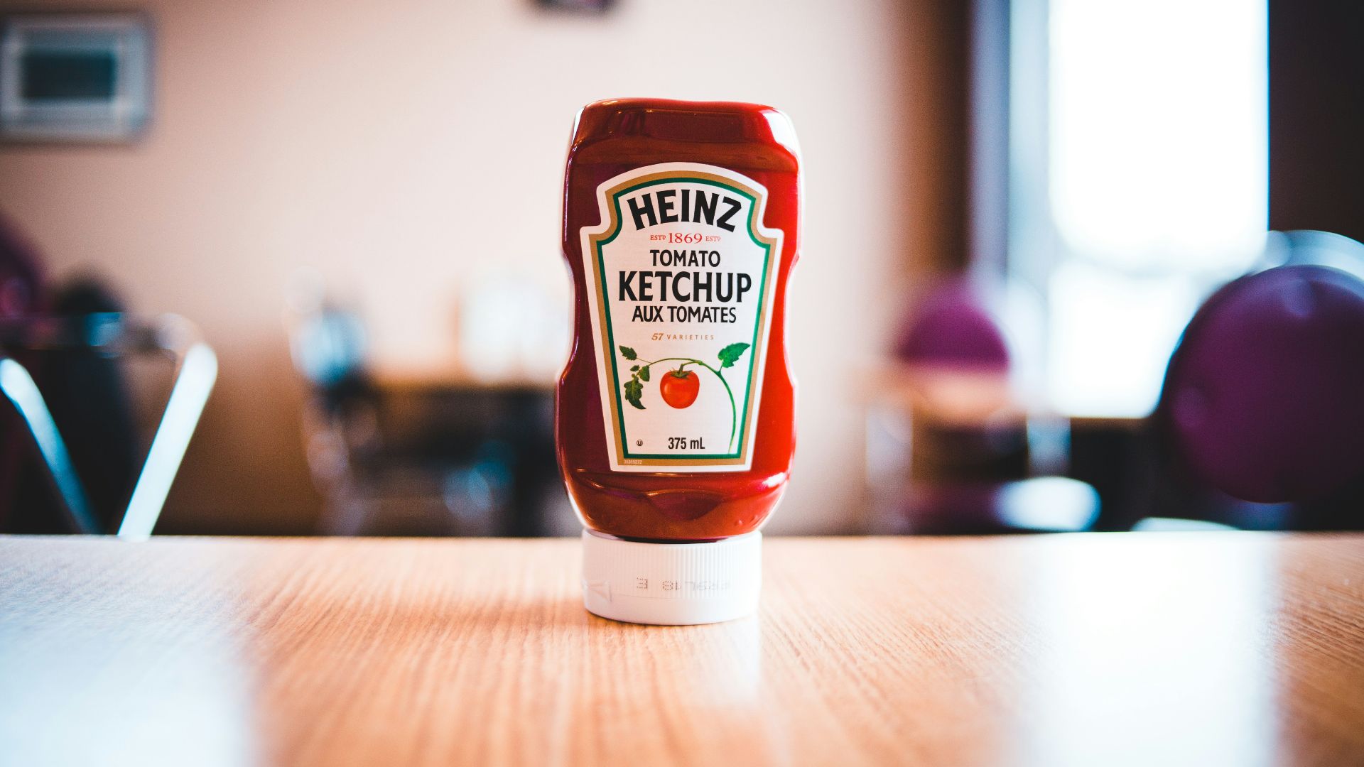 heinz tomato ketchup bottle on brown wooden table