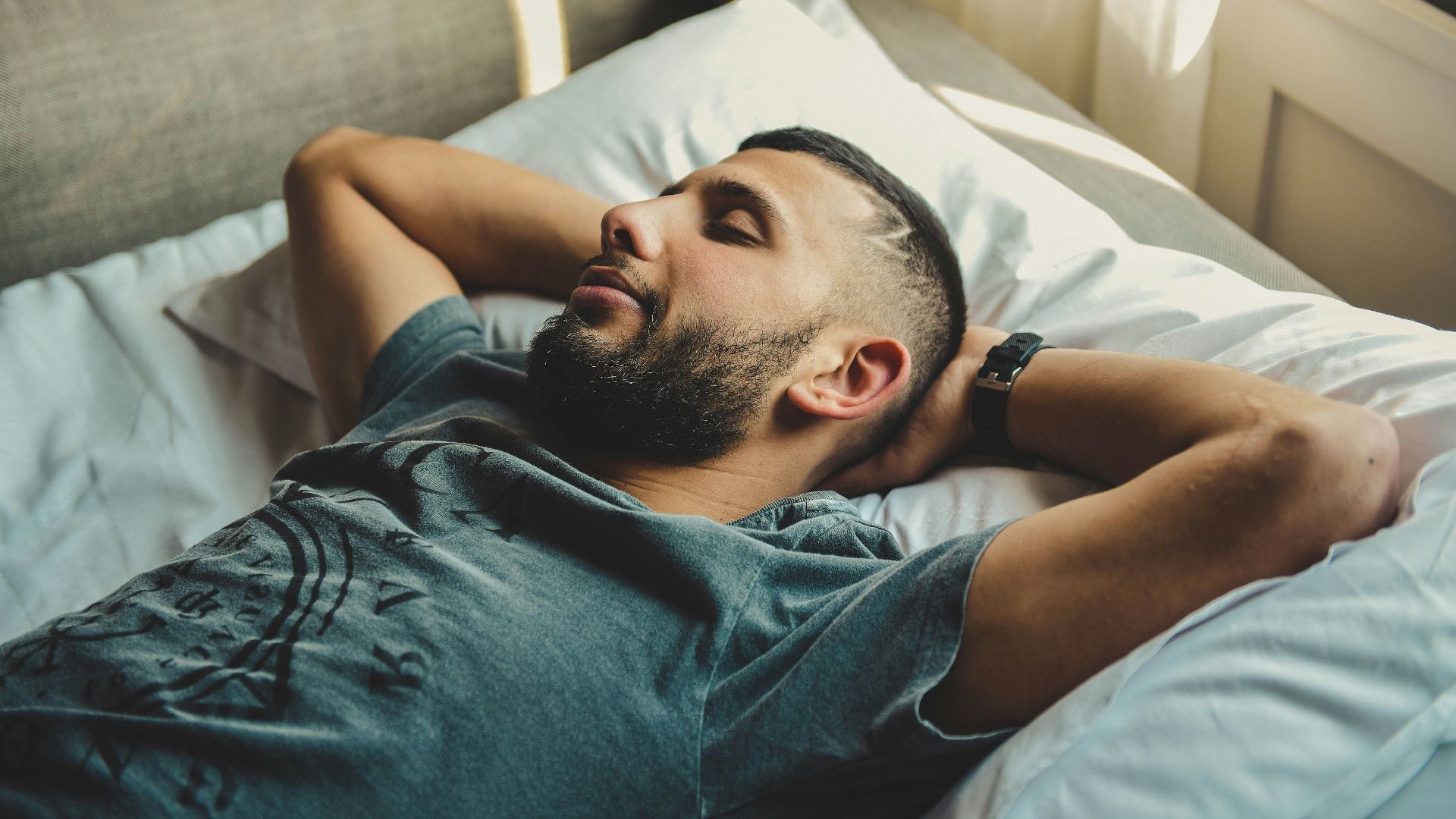 man lying on bed