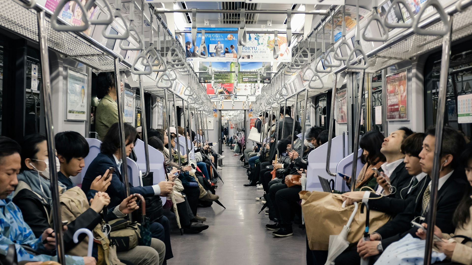 people sitting on train seat