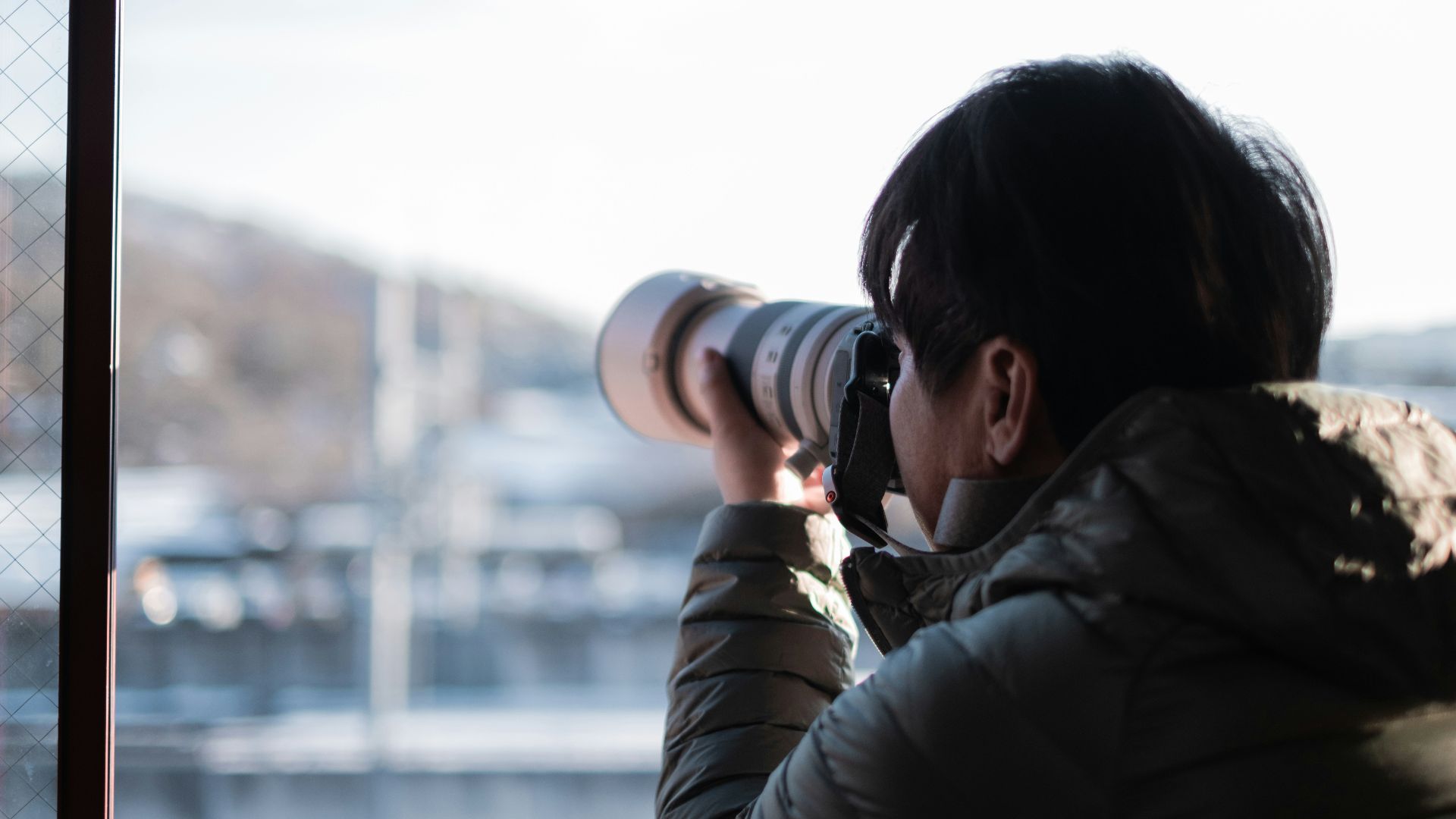 a woman taking a photo with a camera