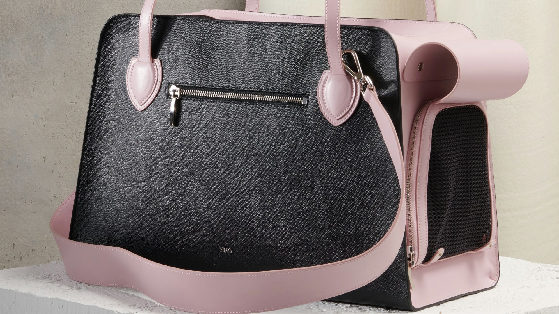 black and pink leather handbag