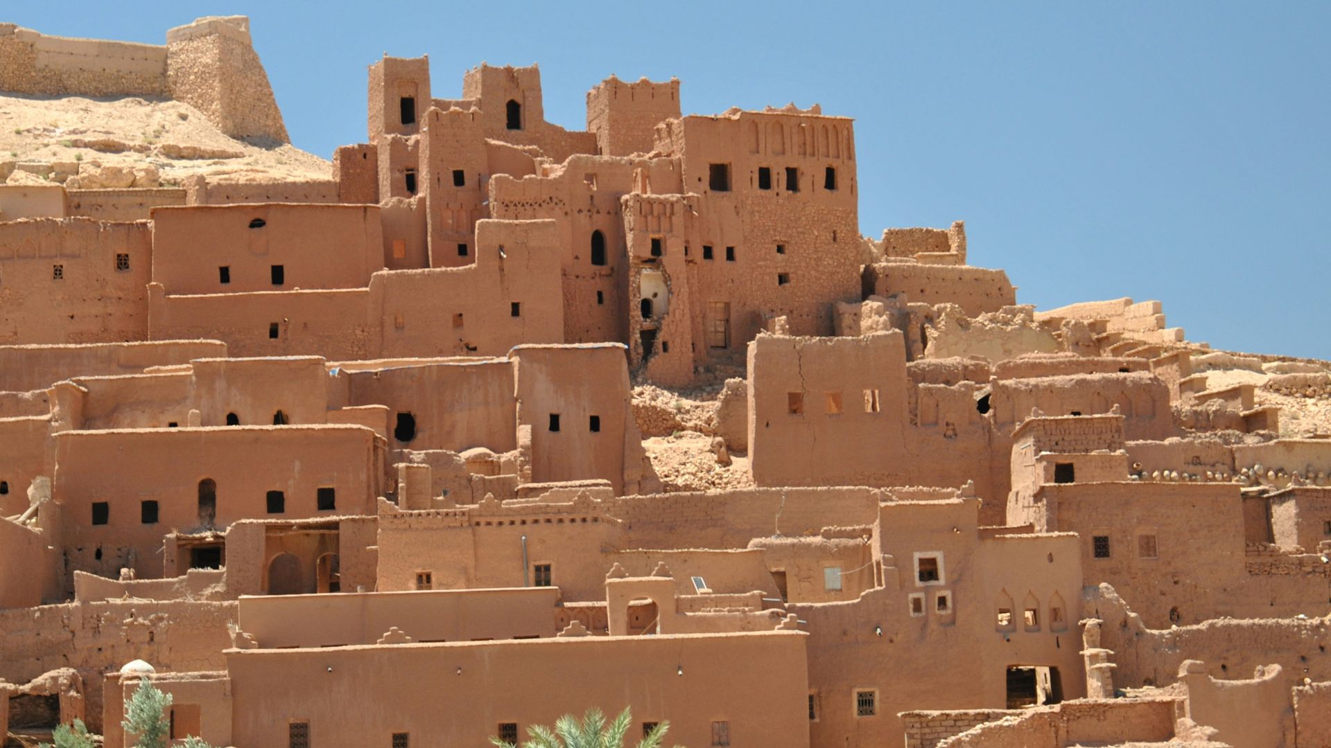 brown concrete building under blue sky during daytime