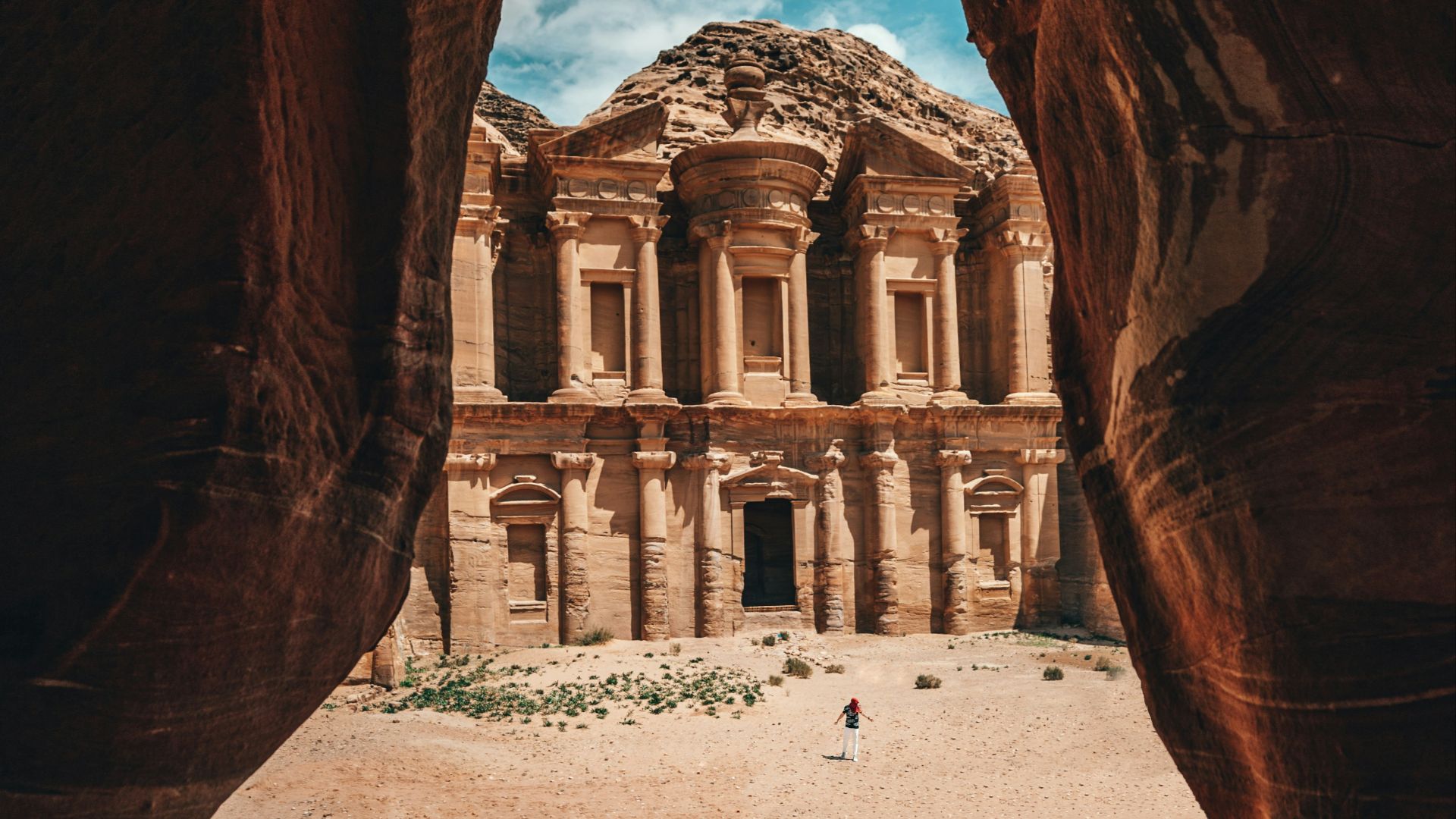 brown building on desert