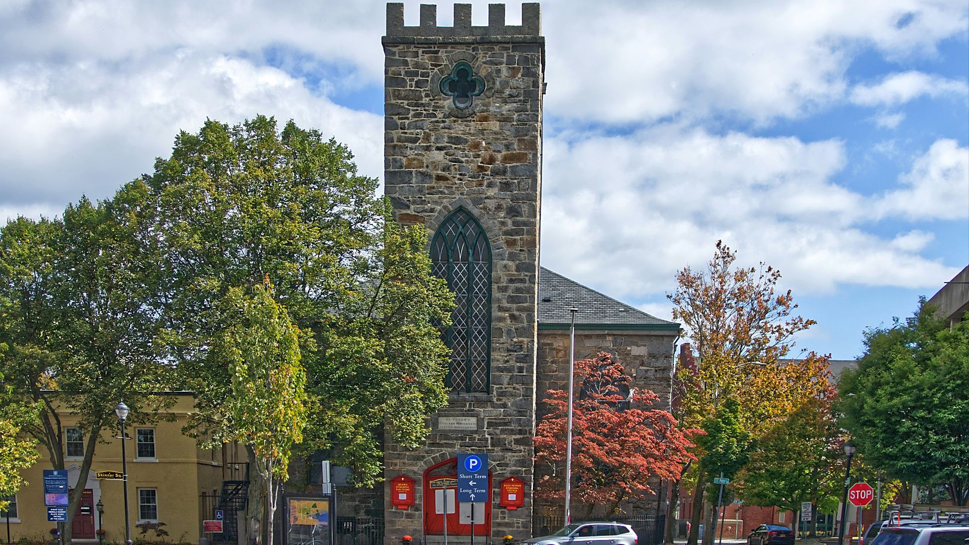silver SUV near the building