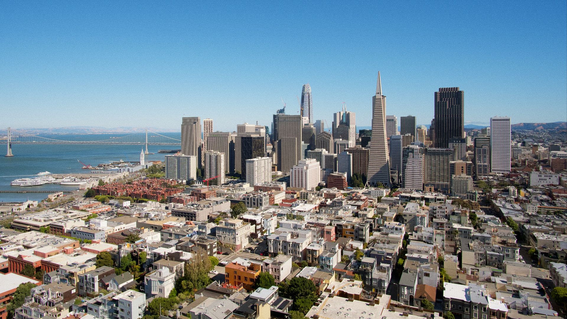 city buildings under blue sky during daytime